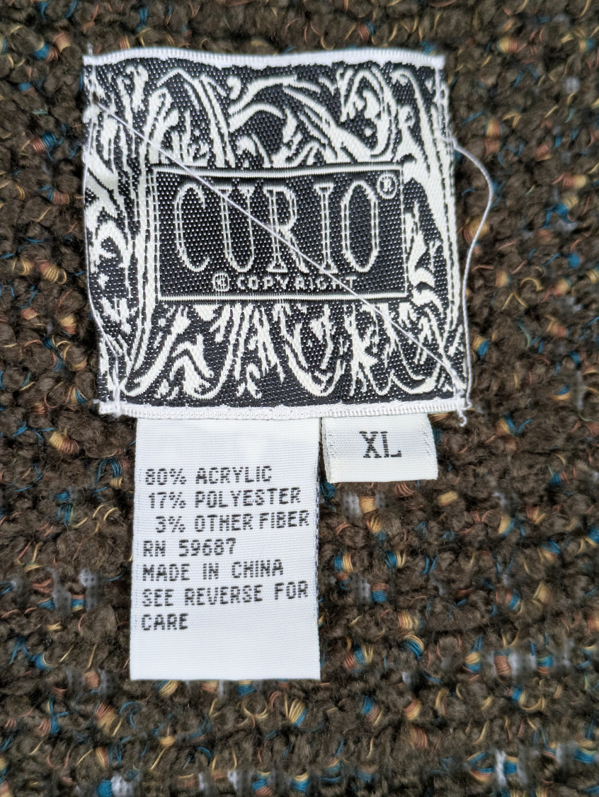 Curio Fringed Olive Green Open-front Long Sweater Vest Size XL Introducing our Curio Fringed Olive Green Sweater Vest! This open-front vest offers a boho twist with