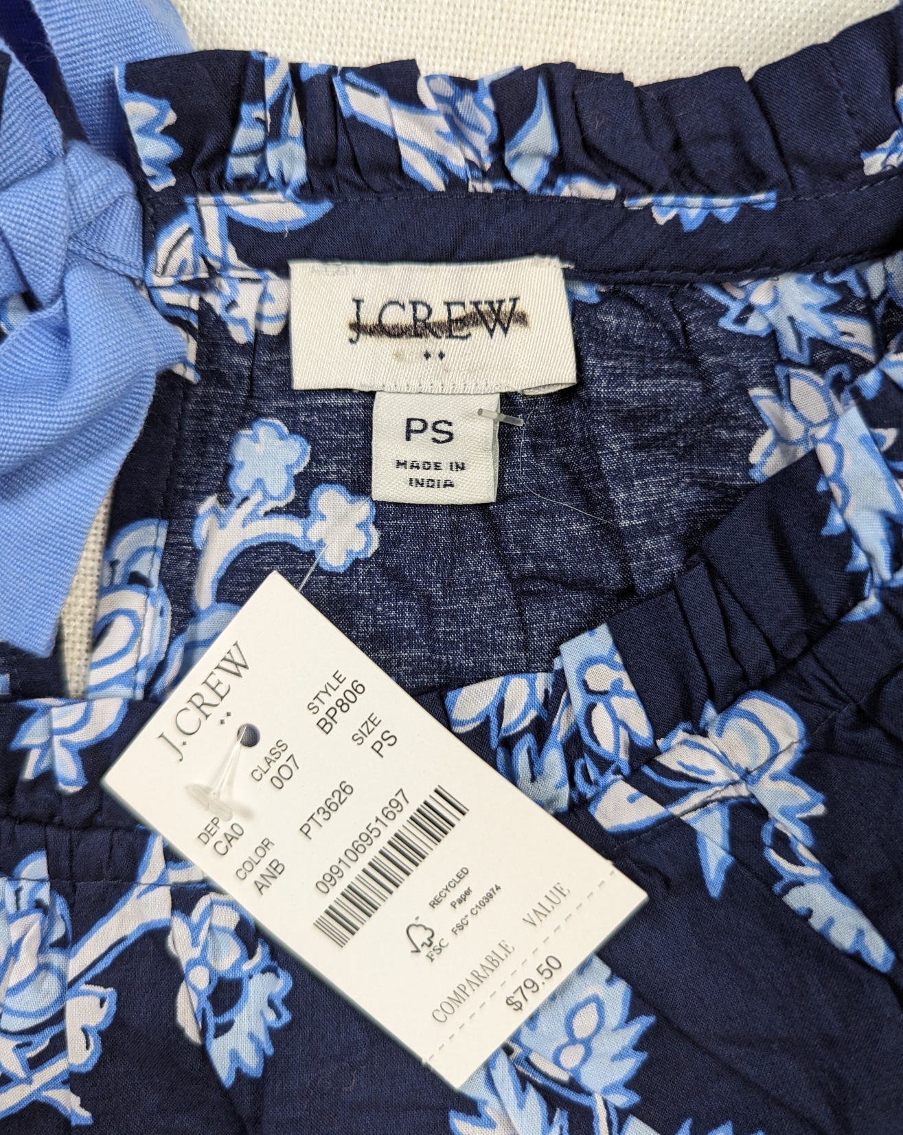 J Crew Navy Floral Smock Neck Long Sleeve Blouse Size PS Elevate your wardrobe with the J Crew Navy Floral Smock Neck Blouse. This long sleeve top features a stylish