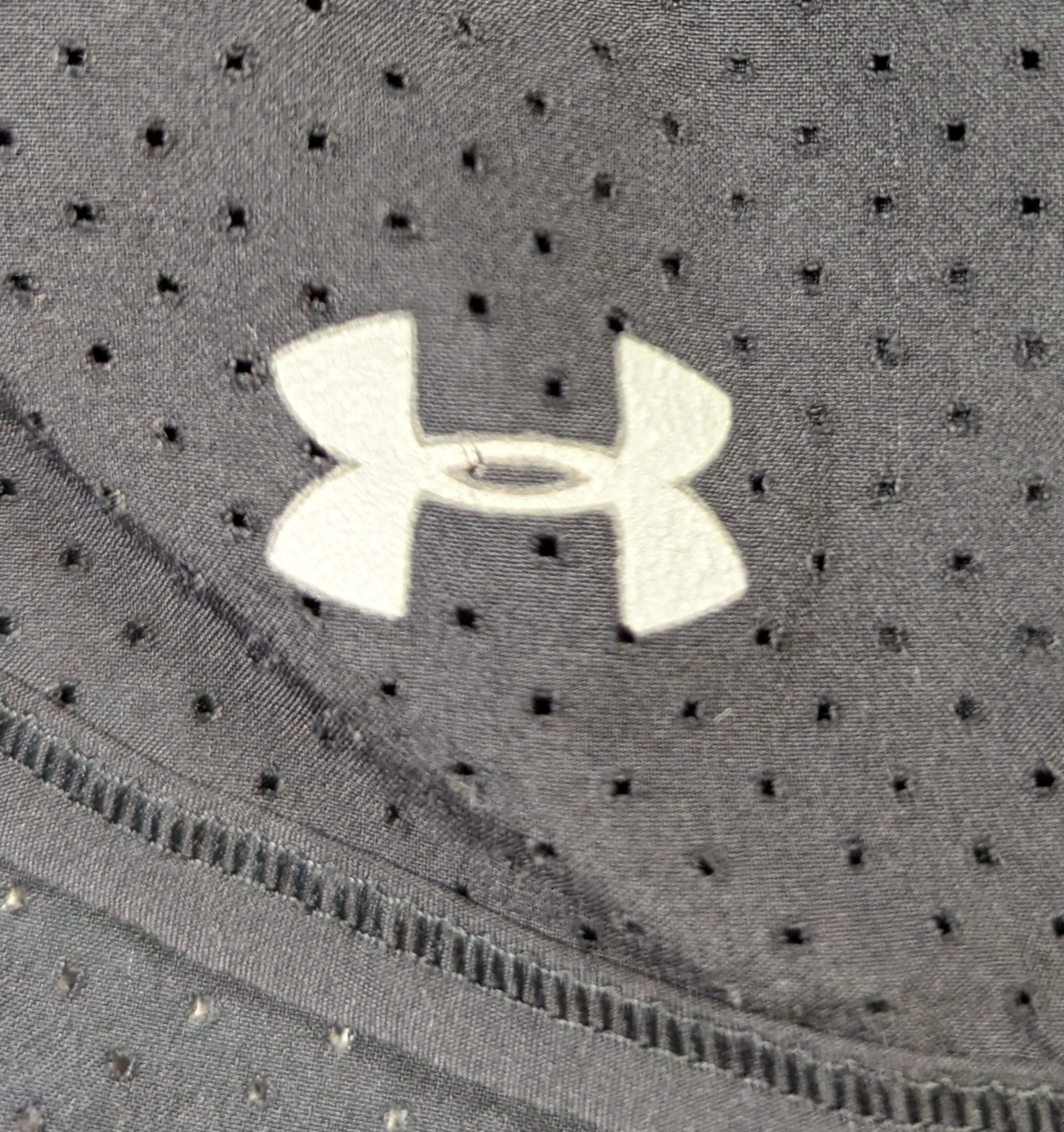 Under Armour Black Mesh Running Shorts with Pink Waist bandGet ready to run in style with these Black Mesh Running Shorts from Under Armour. Made with comfortable me