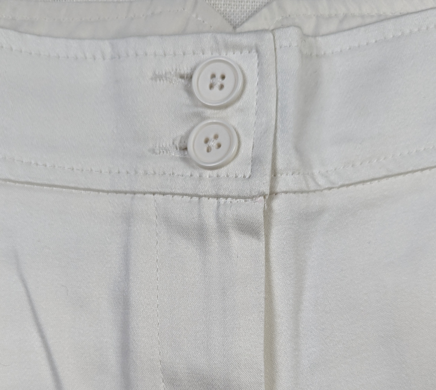 The Limited White Shorts Size 4 - NWT Stay cool and stylish in these Limited White Shorts, featuring front pockets with 3-button closure and back flap pockets for com