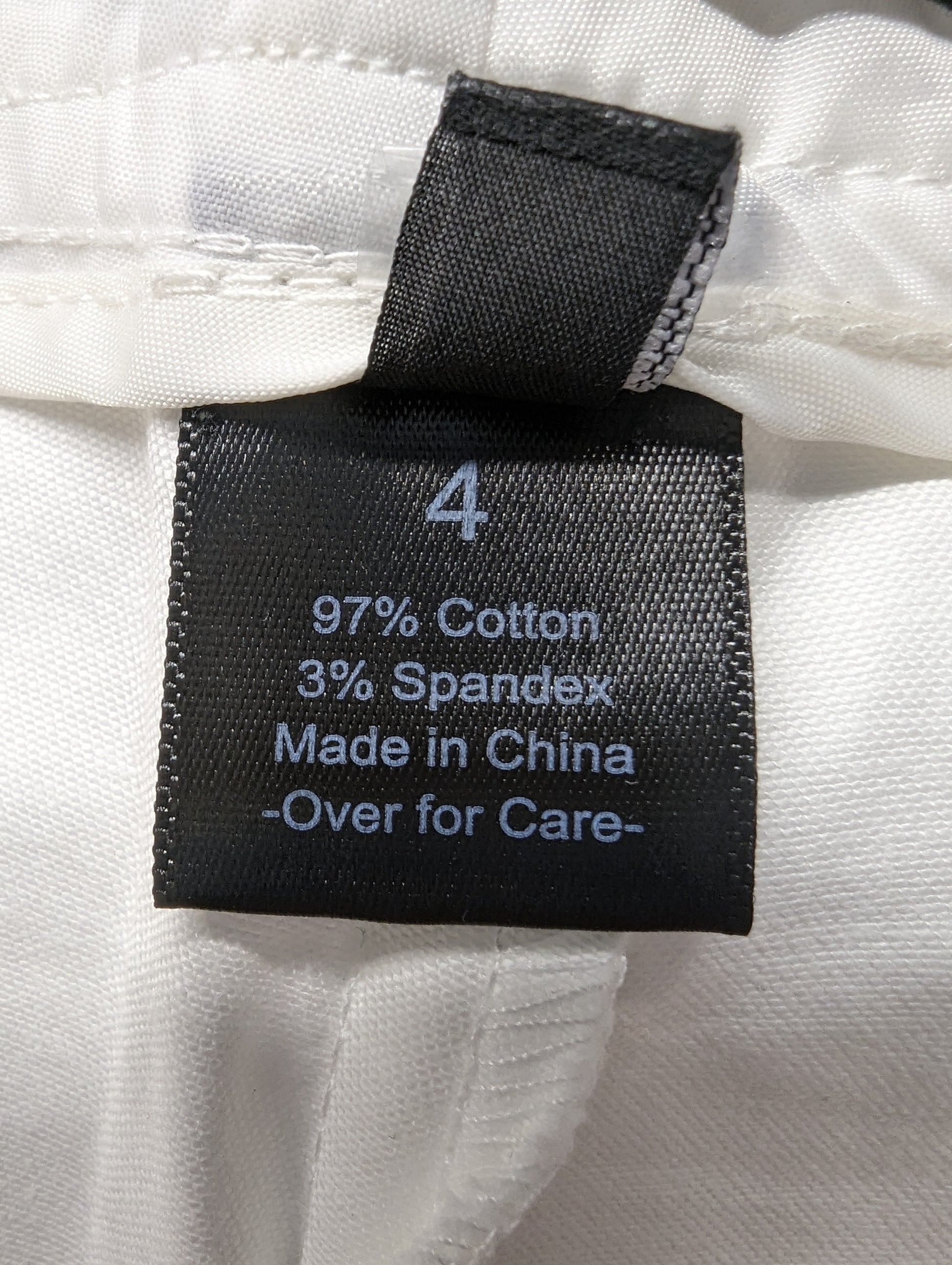 The Limited White Shorts Size 4 - NWT Stay cool and stylish in these Limited White Shorts, featuring front pockets with 3-button closure and back flap pockets for com