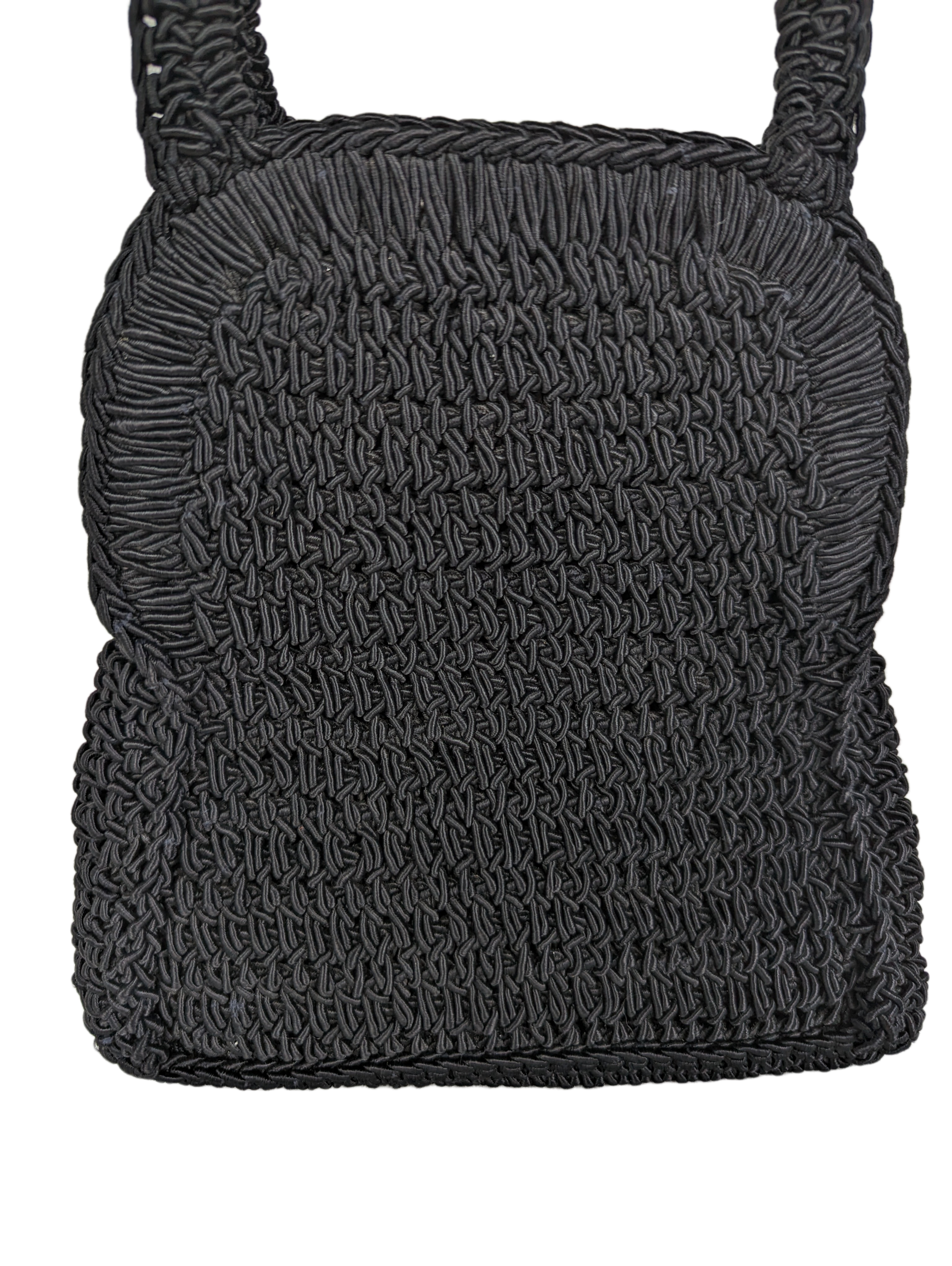 Rodanan Ltd.Perfect bag for evening out or brunch with the girls!  
Measures:   L - 7"  W - 1"  H - 8"  Strap - 11"HandbagVintage Rodana Ltd. Crochet HandbagVintage Rodana
