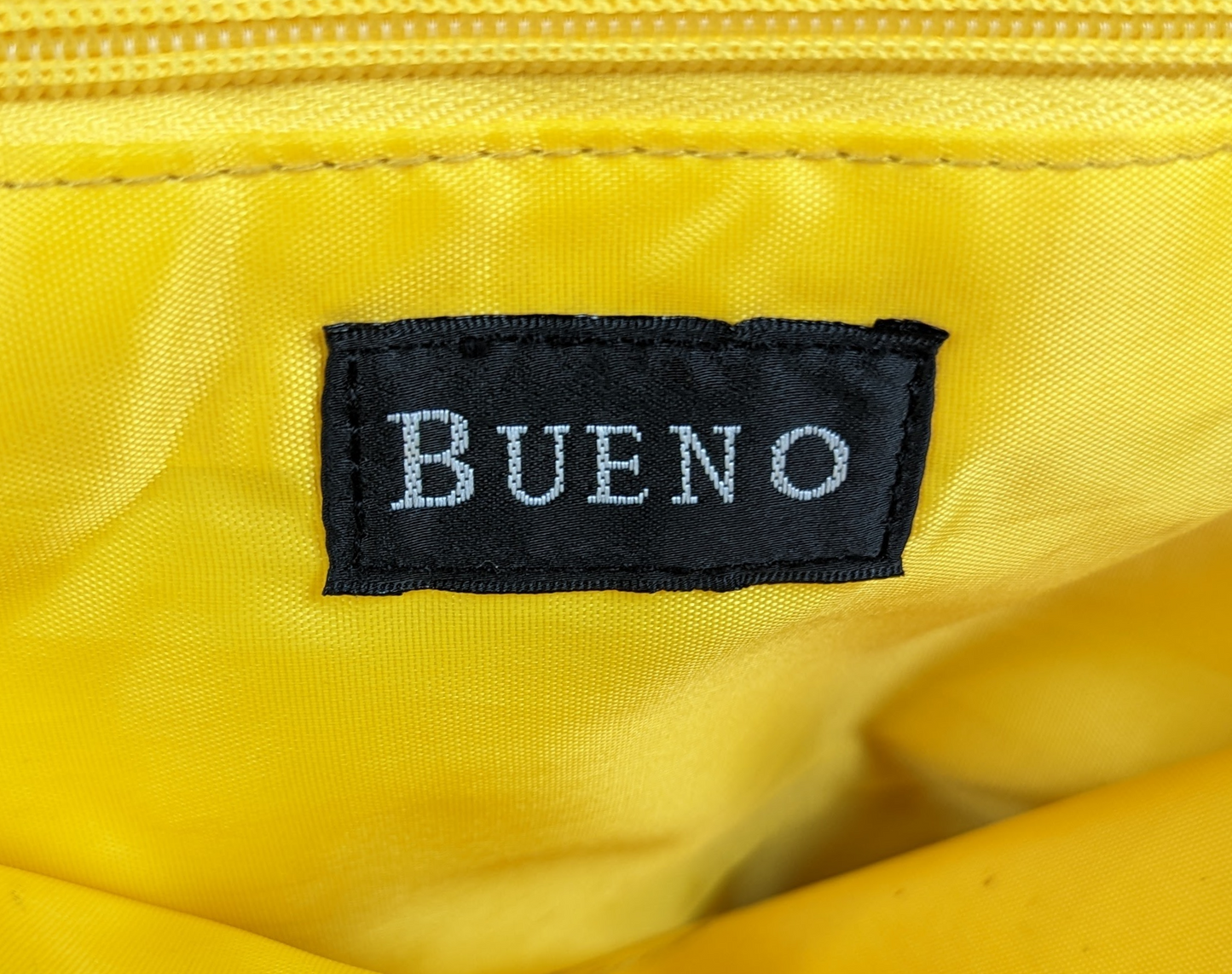 BuenoGorgeous bag with lots of room for all your essentials!  
Measurements:  L - 14"  W - 4 1/2"  H - 12"  Strap - 25"HandbagBueno Embellished HandbagBueno Embellished Handbag