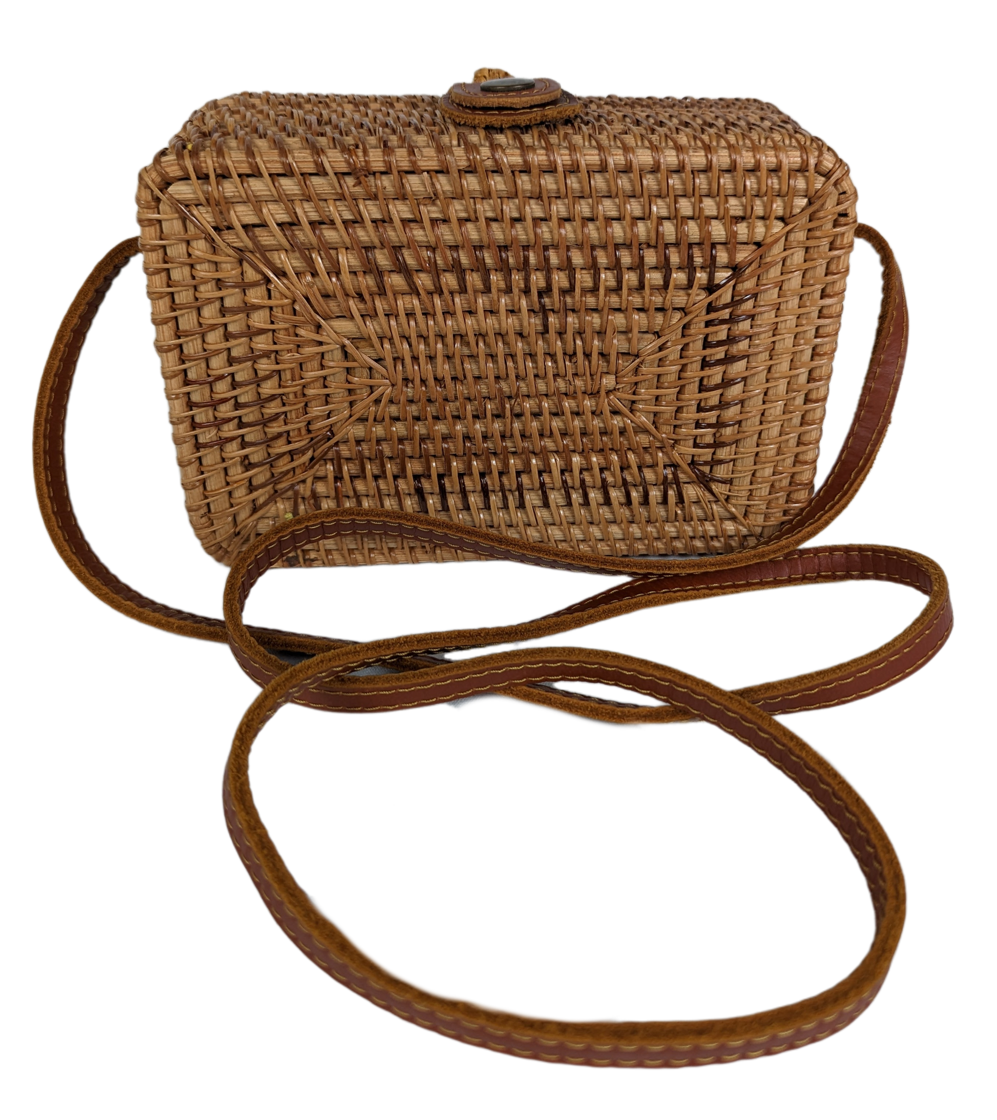 Rectangular Wicker Handbag with Leather Strap and Closure Perfect for summertime, this little purse is ideal for a day shopping or out to brunch.  Measurements:  L - 7 1/2"   W - 3"    H - 5"   Strap - 50"HandbagWicker Rectangular Purse with Leather Strap and ClosureWicker Rectangular Purse