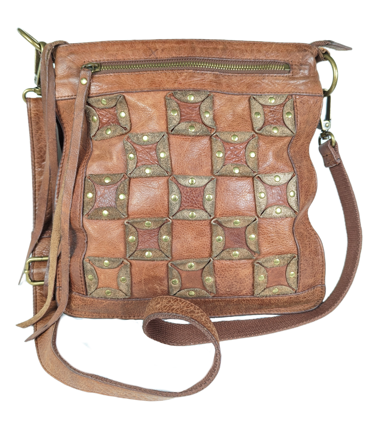 Lucky BrandBeautiful, well-worn leather purse.  Large zip pockets in front and back, and three pockets on inside.  Small pen mark, seen in photo.Purse, handbagLucky Brand Studded Leather PurseLucky Brand Studded Leather Purse