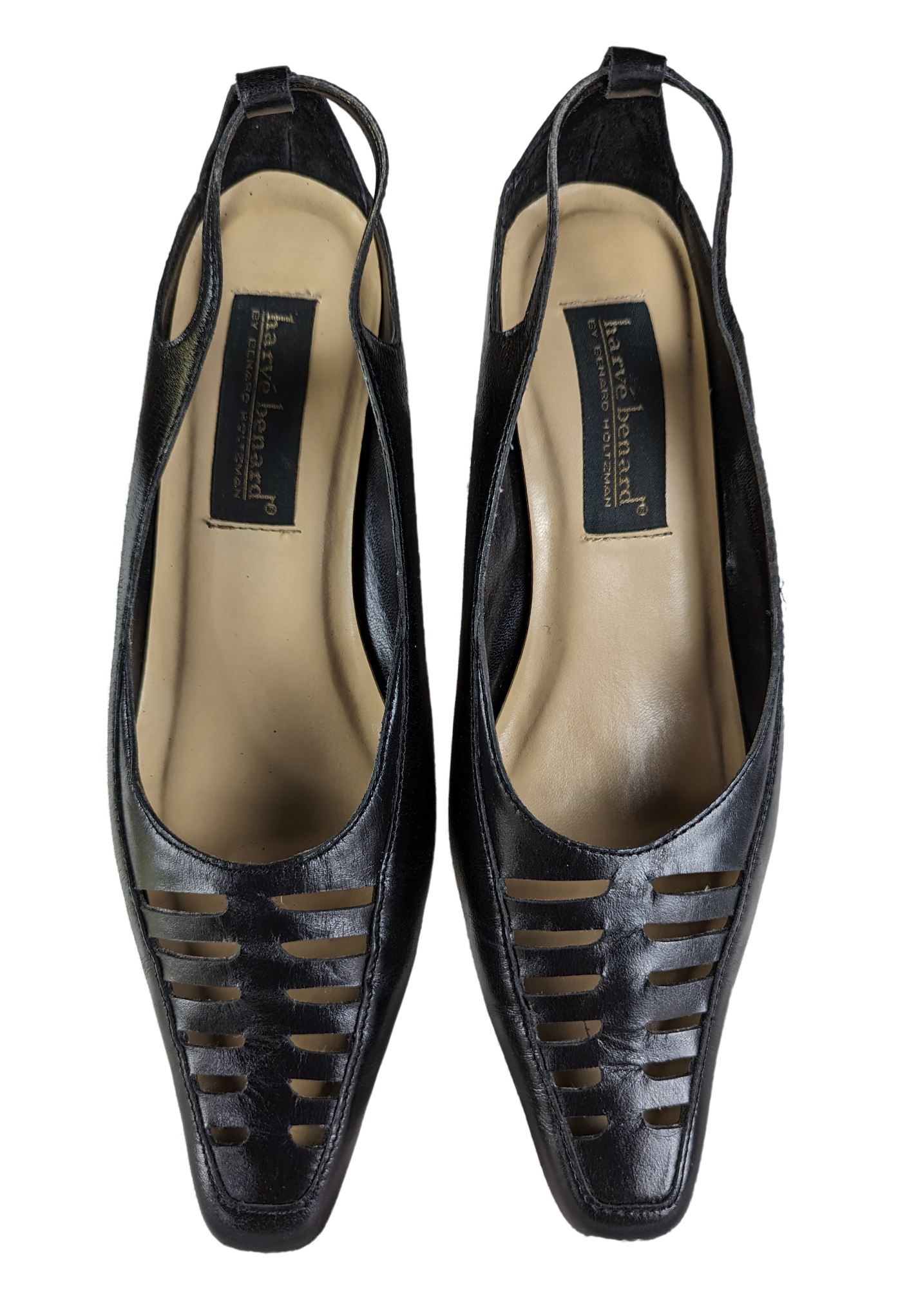 Harve Bernard Black Kitten Heels with Cut outs size 8W Step into style with these Harve Bernard Black Kitten Heels. Made of sleek black leather and featuring trendy