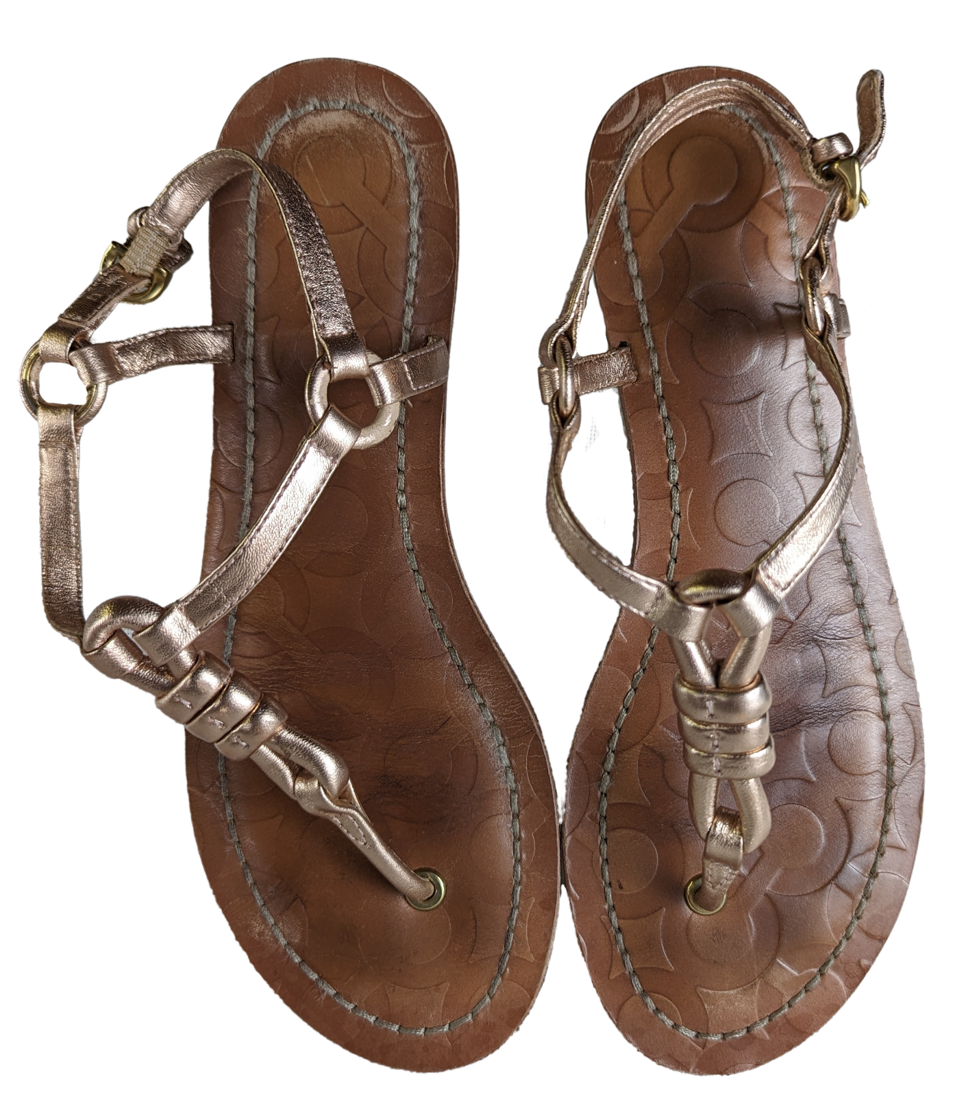 Coach Sawyer Rose Gold Leather Sandals Size 7.5 Strut your stuff in these Coach Sawyer Sandals! With a sleek rose gold leather design, these size 7.5 sandals offer a