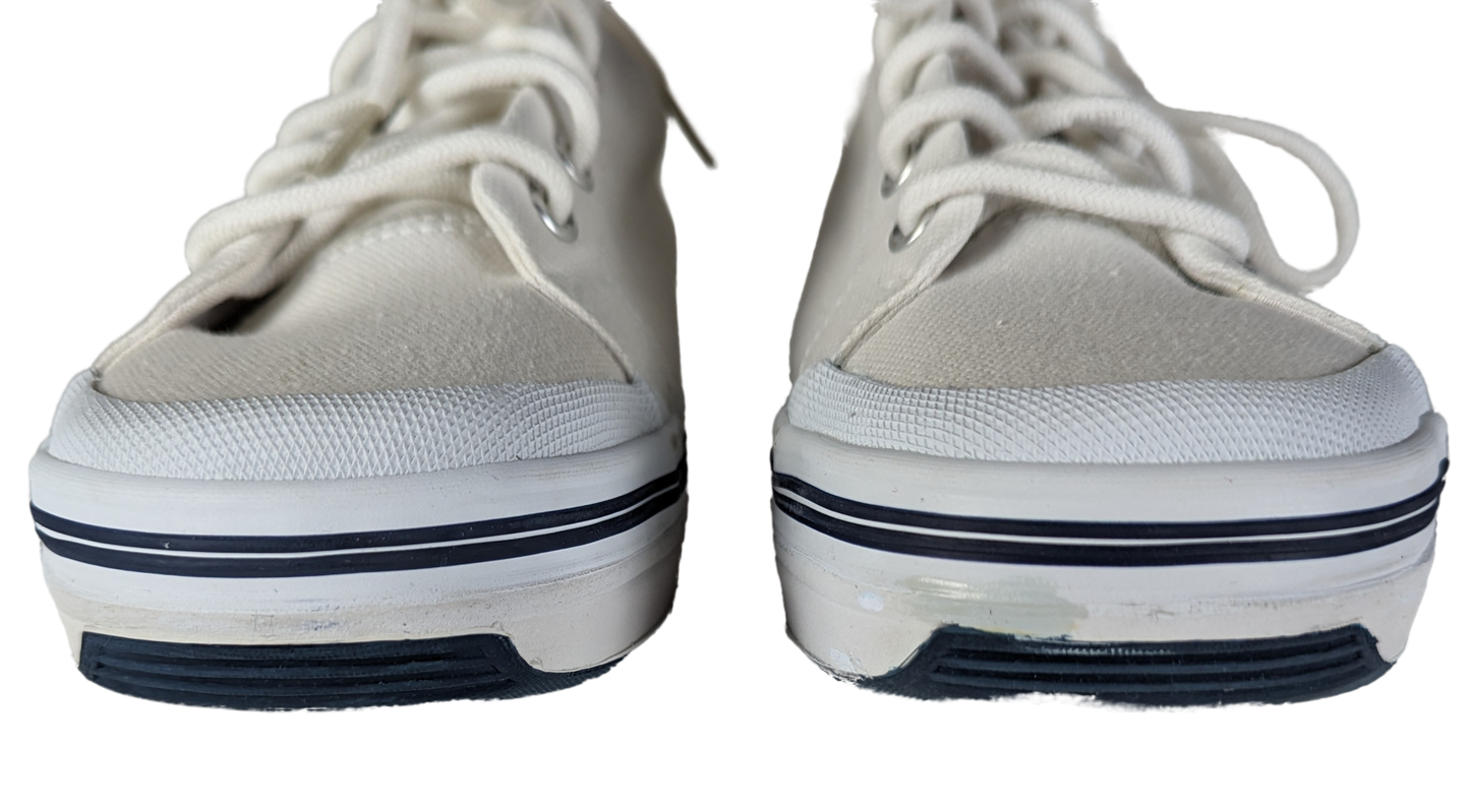 Totes Sport White Sneakers Size 8W Elevate your style and comfort with Totes Sport White Sneakers. Designed with a canvas upper and rubber sole, these sneakers provi