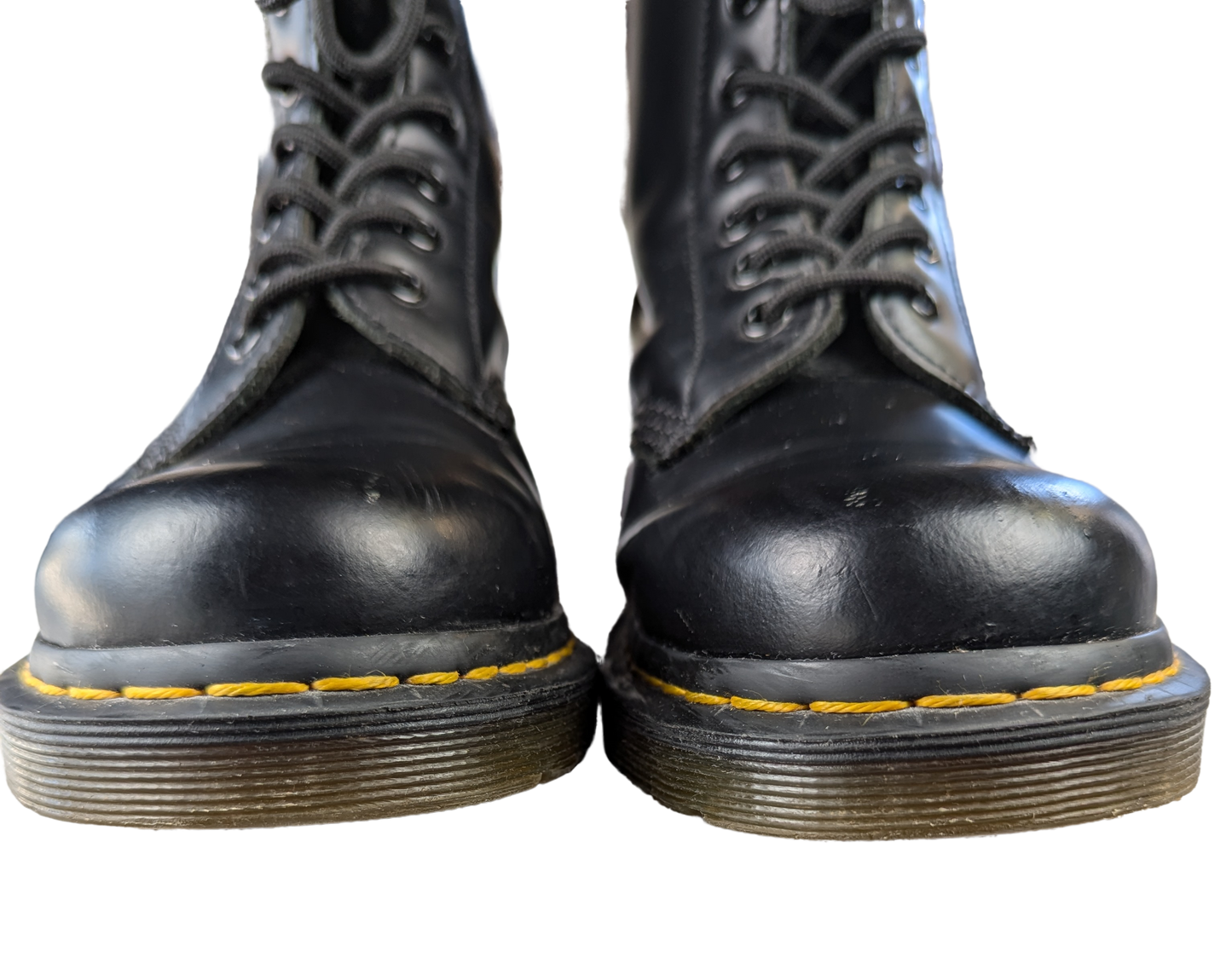 Doc Marten's Black 1460 Boots EUC Size 7  These Doc Marten's 1460 boots are a must-have for any fashion-forward woman. Crafted from high-quality leather, these lace-u