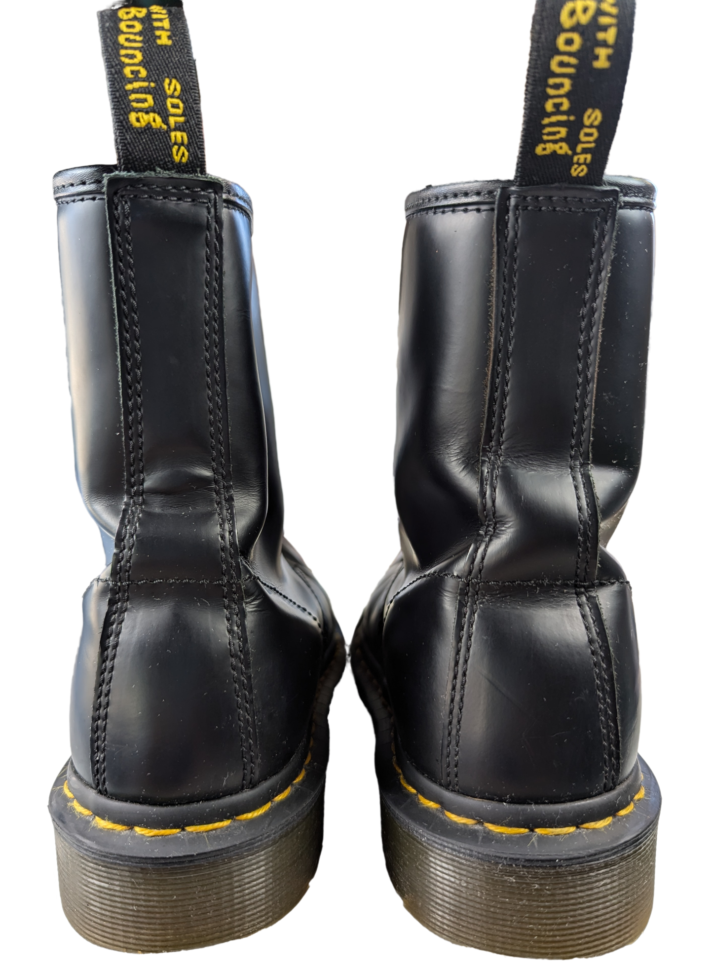 Doc Marten's Black 1460 Boots EUC Size 7  These Doc Marten's 1460 boots are a must-have for any fashion-forward woman. Crafted from high-quality leather, these lace-u
