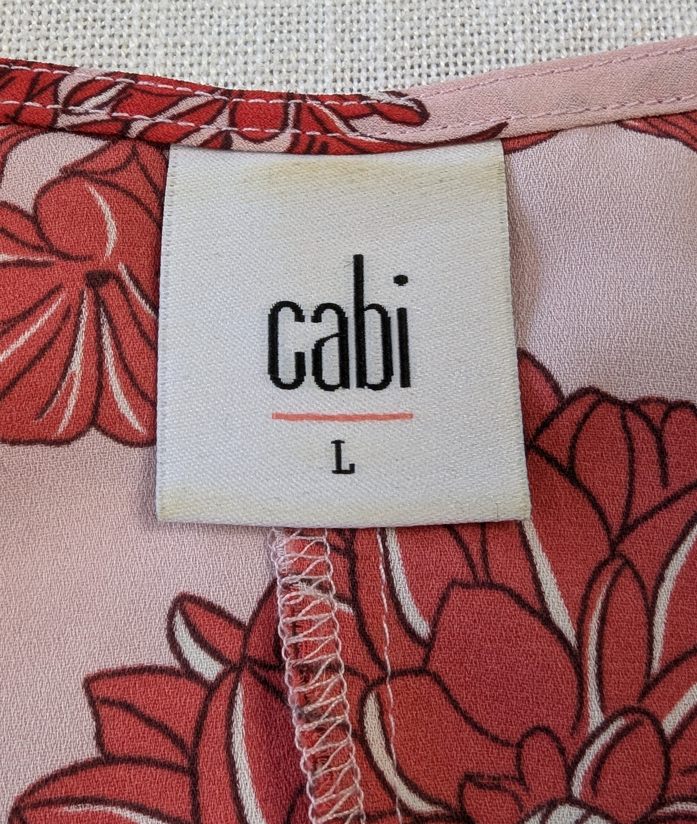 CAbi Adore Cami Tank Top with Adjustable Straps Size Large This beautiful CAbi Adore Cami Tank Top is perfect for any occasion. The Cranberry Crush color and colorfu