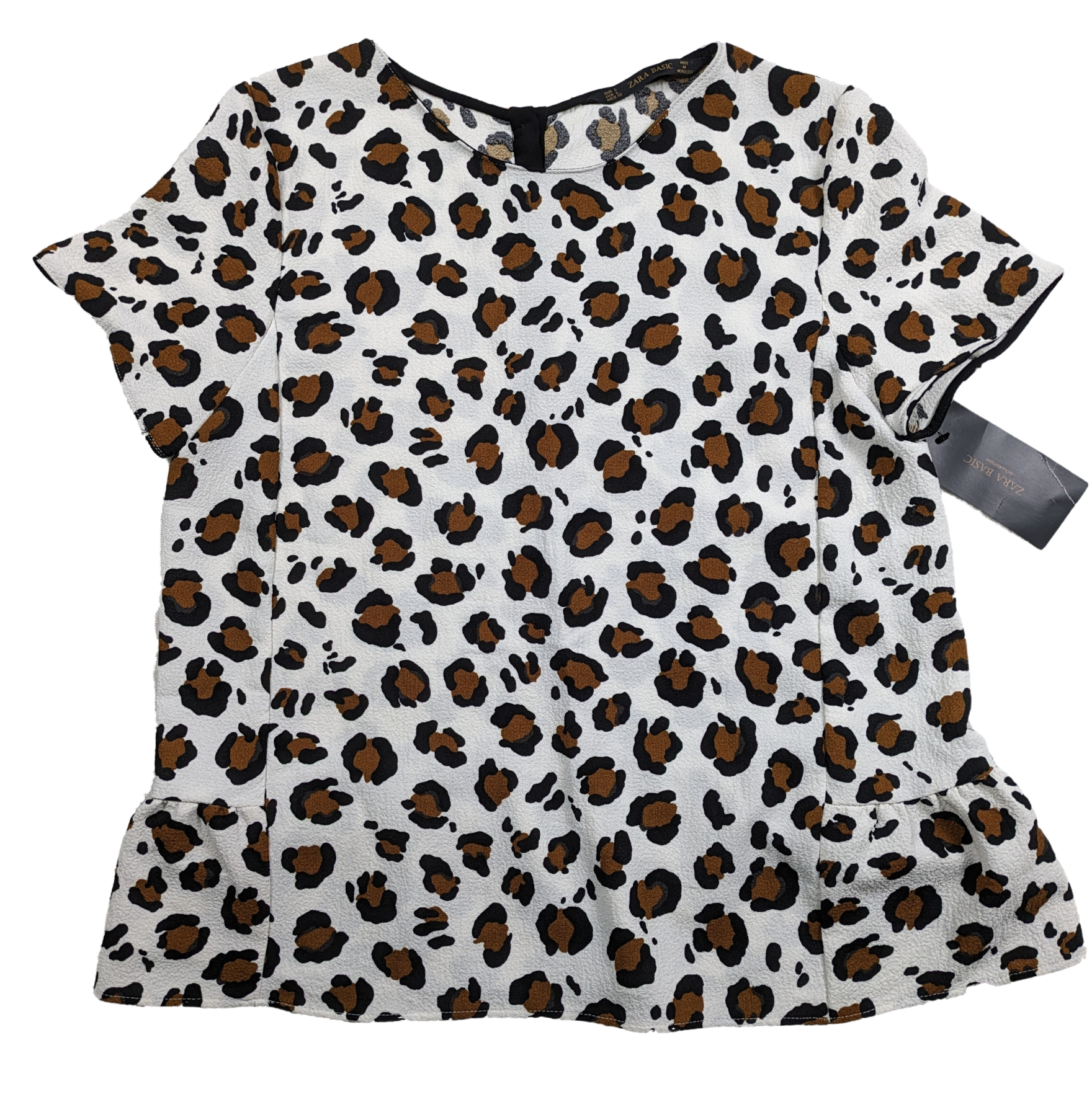 Zara Animal Print Short Sleeve Blouse with Peplum Size Large - NWT Unleash your wild side with our Zara Animal Print Blouse! This playful short sleeve top features a