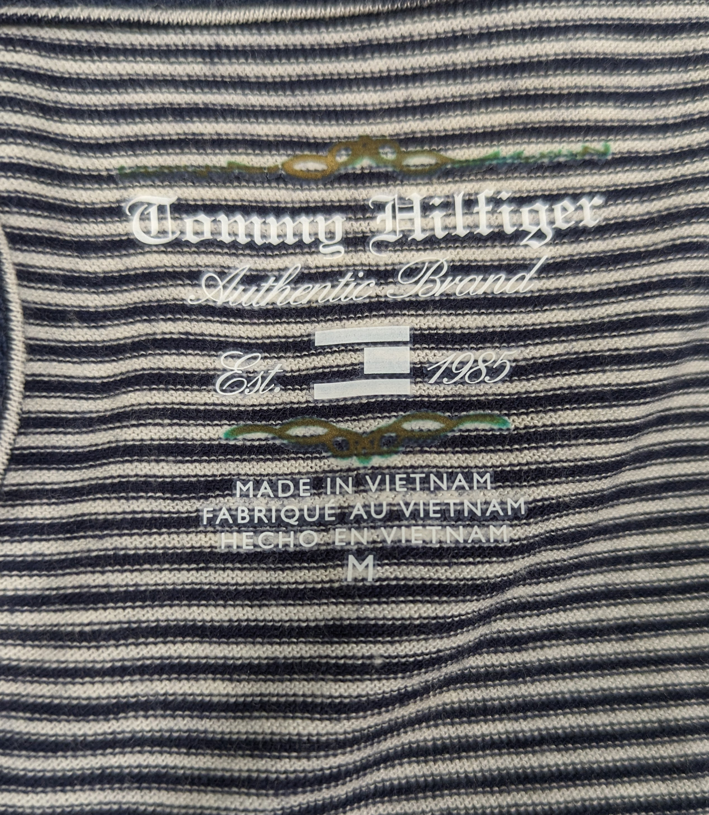 Tommy HIlfiger Striped Cap-Sleeve T Shirt with Ruffle Sleeves Size MStep up your t-shirt game with the Tommy Hilfiger Striped Cap-Sleeve T Shirt! Made with this navy