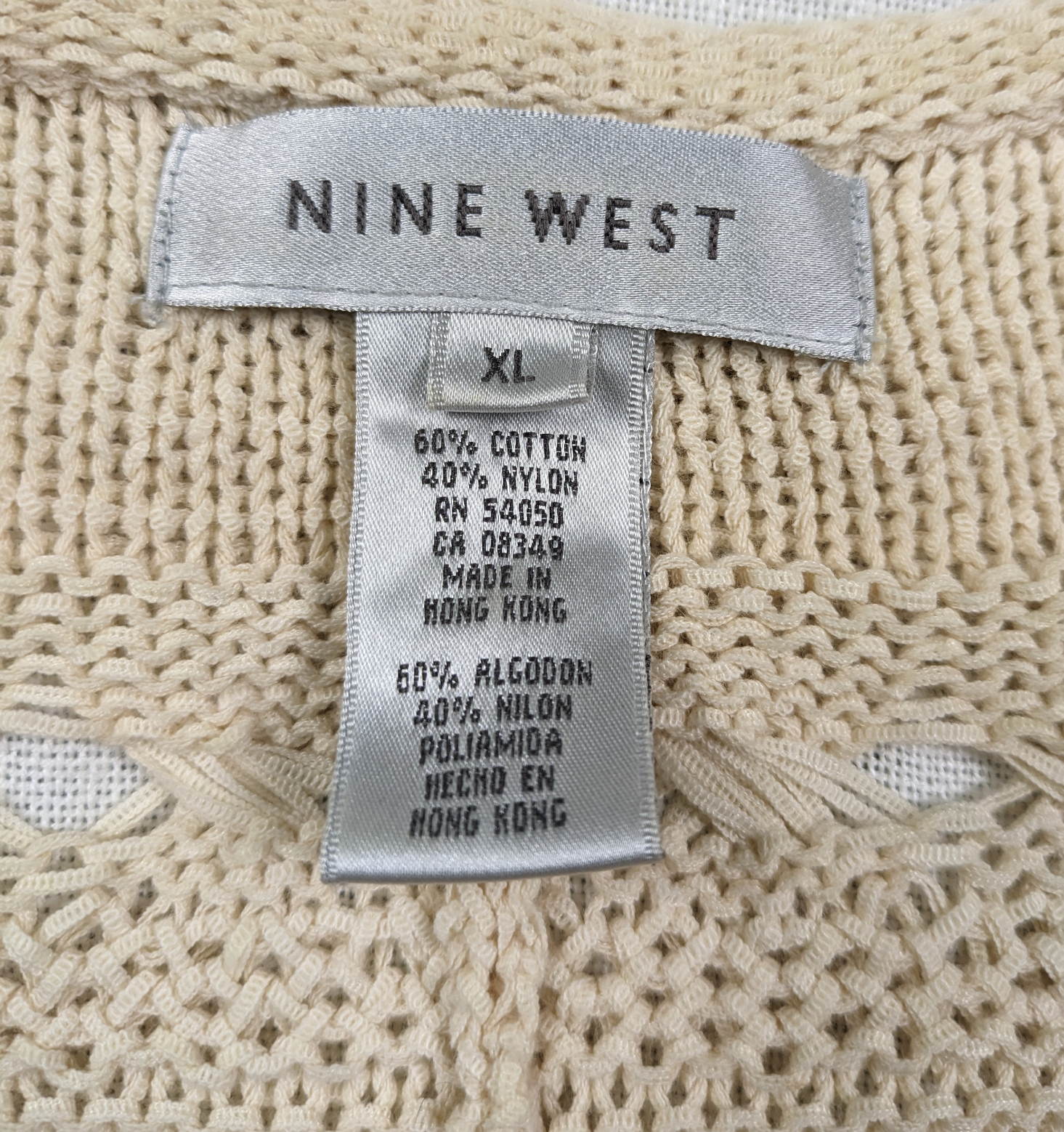 Nine West Crochet Beaded Tie-Front Cardigan size XL Upgrade your wardrobe with this playful Nine West Crochet Beaded Tie-Front Cardigan in size XL. Vintage-inspired