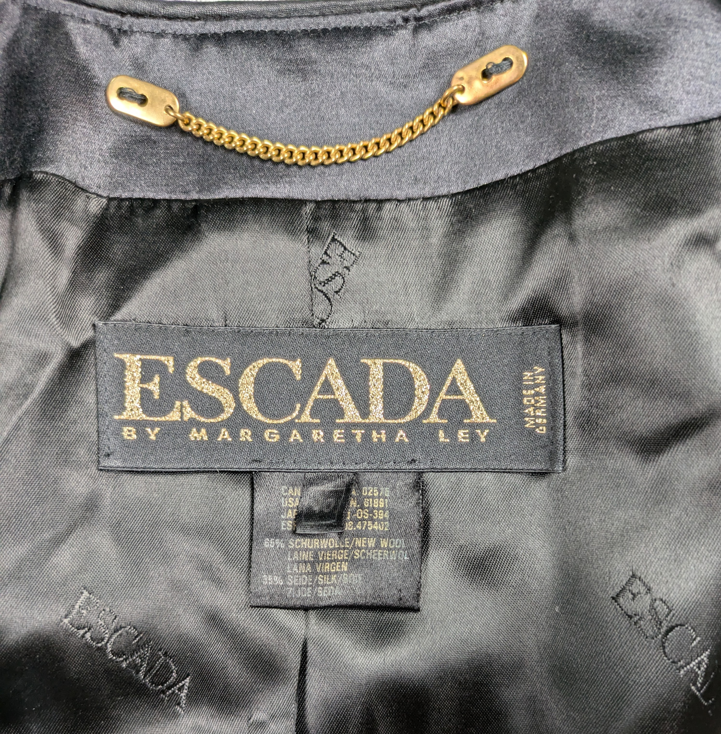 Vintage Escada Black and Gold Geometric Design Blazer Size 40 Discover timeless elegance with our Vintage Escada Black and Gold Geometric Design Blazer. Crafted with