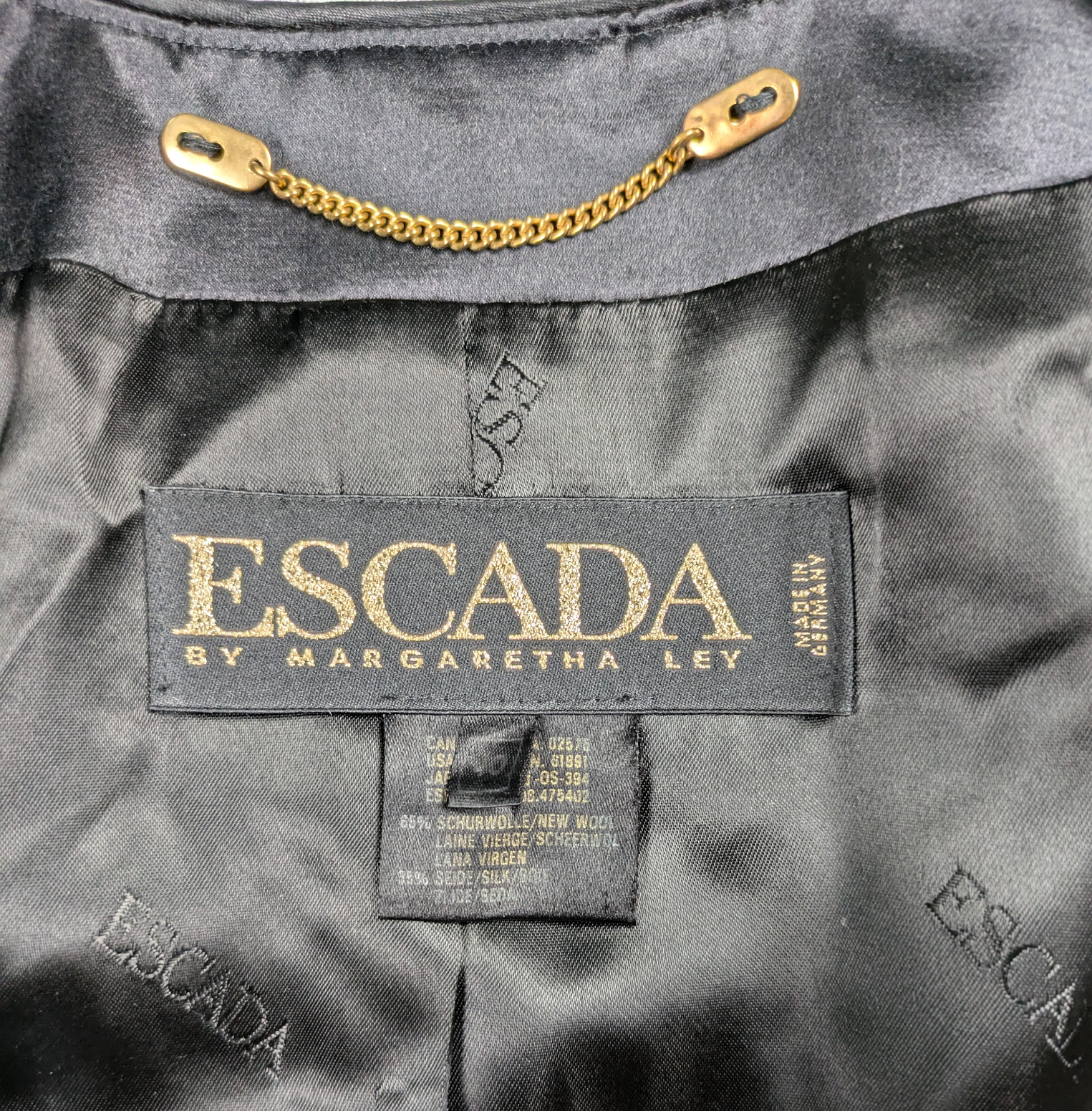 Vintage Escada Black and Gold Geometric Design Blazer Size 40 Discover timeless elegance with our Vintage Escada Black and Gold Geometric Design Blazer. Crafted with