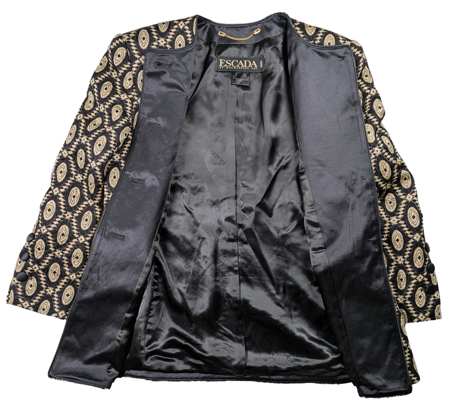 Vintage Escada Black and Gold Geometric Design Blazer Size 40 Discover timeless elegance with our Vintage Escada Black and Gold Geometric Design Blazer. Crafted with
