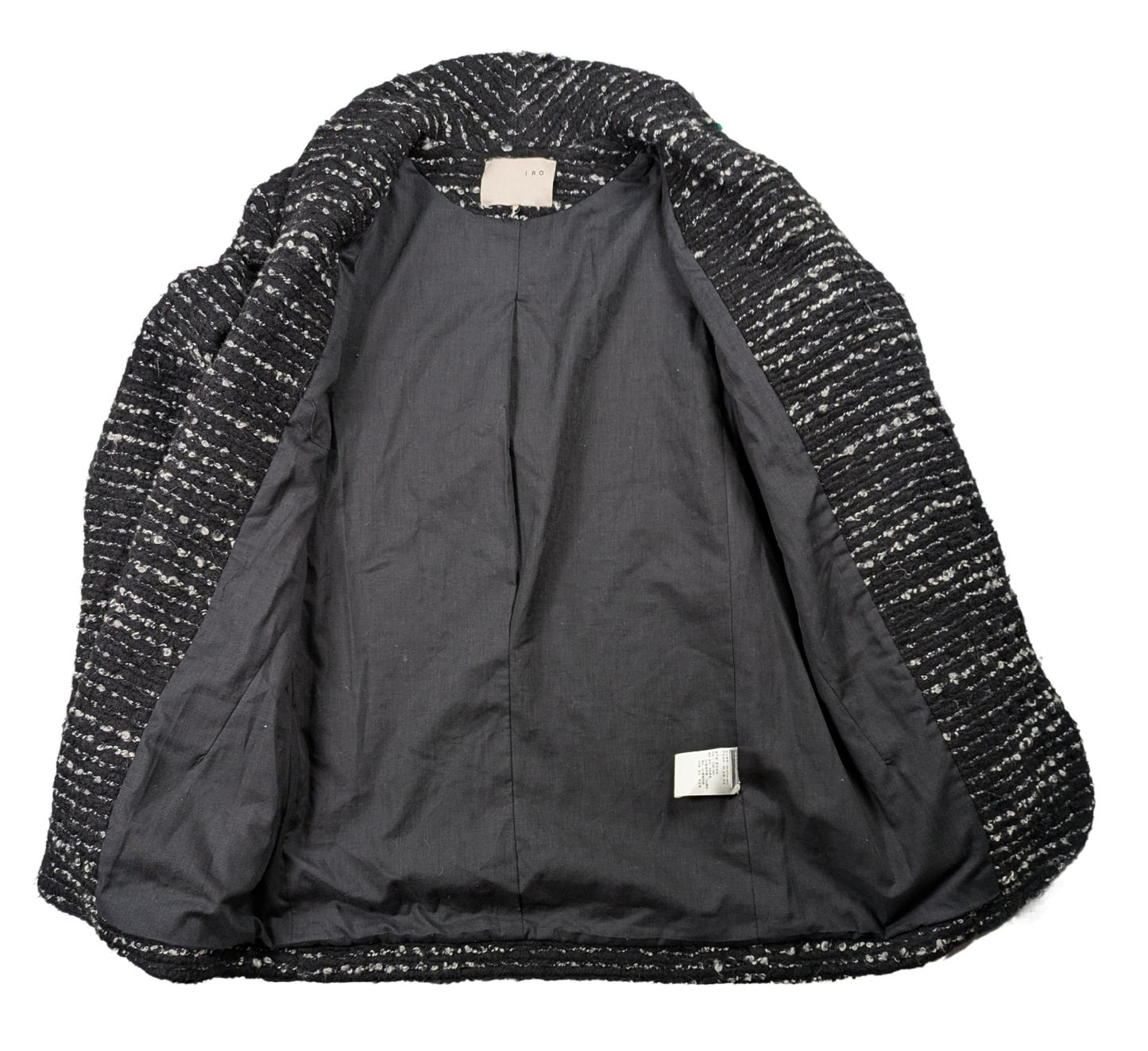 Iro Tweed Pattern Boucle Black & White Jacket Size 0 Indulge in style and luxury with our Iro Tweed Pattern Boucle Jacket. The elegant tweed pattern in classic black