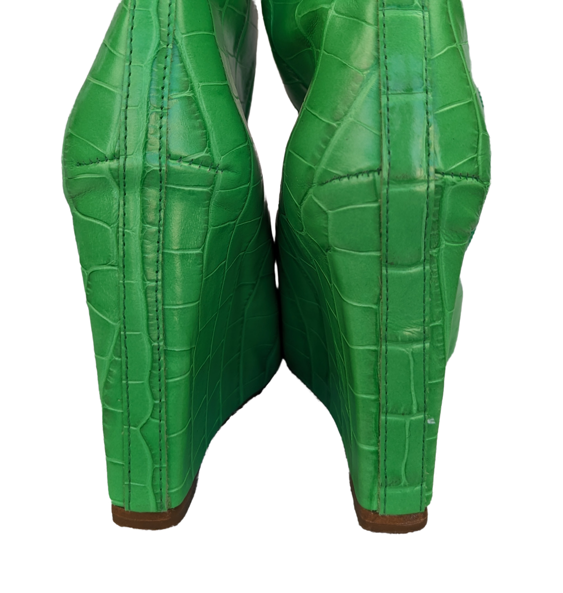 SchutzNothing says style like a great pair of boots!  Make your fashion statement is these amazing faux croc leather boots from Schutz! All your friends will be green withShoesSchutz Asya Up Wedge Knee High BootsWedge Knee High Boots