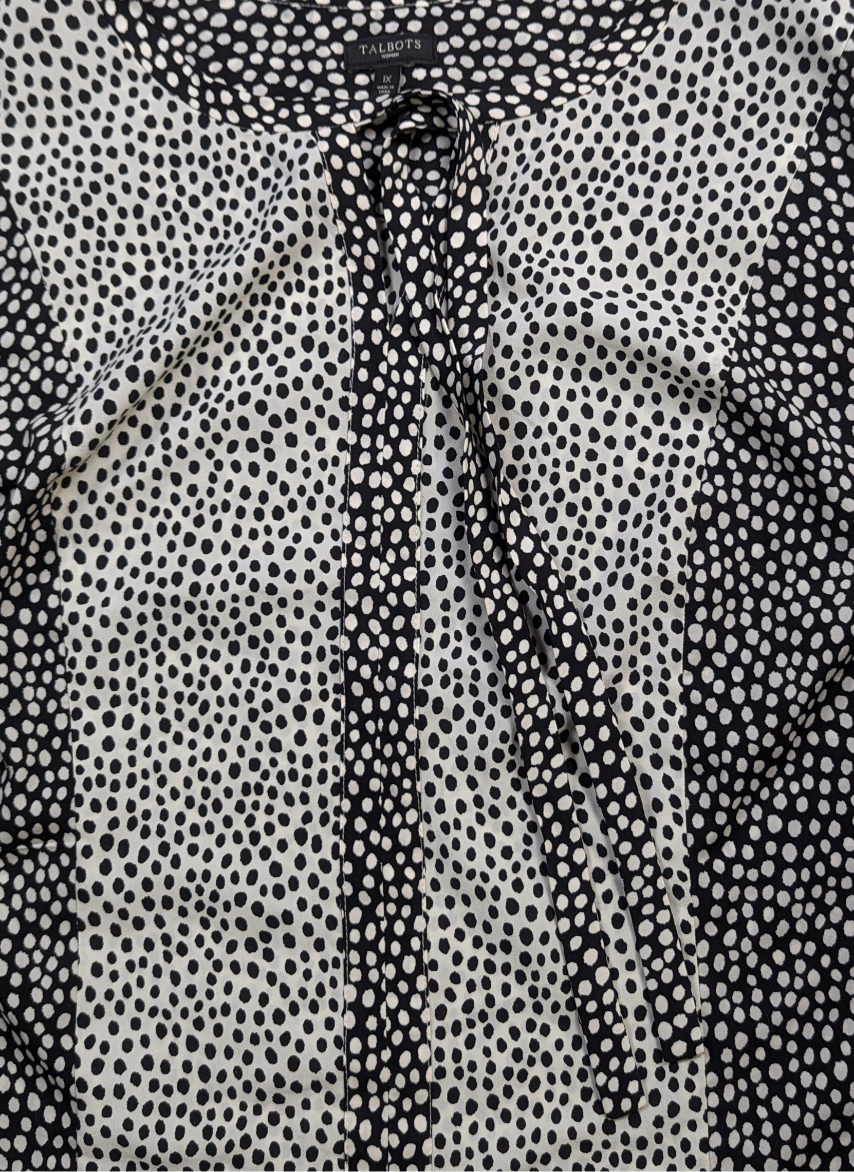 Talbots Black and White Polka Dot Notch Tie Neck Top Size 1X Add some playful polka dots to your wardrobe with this Talbots top! Featuring a stylish notch and tie ne