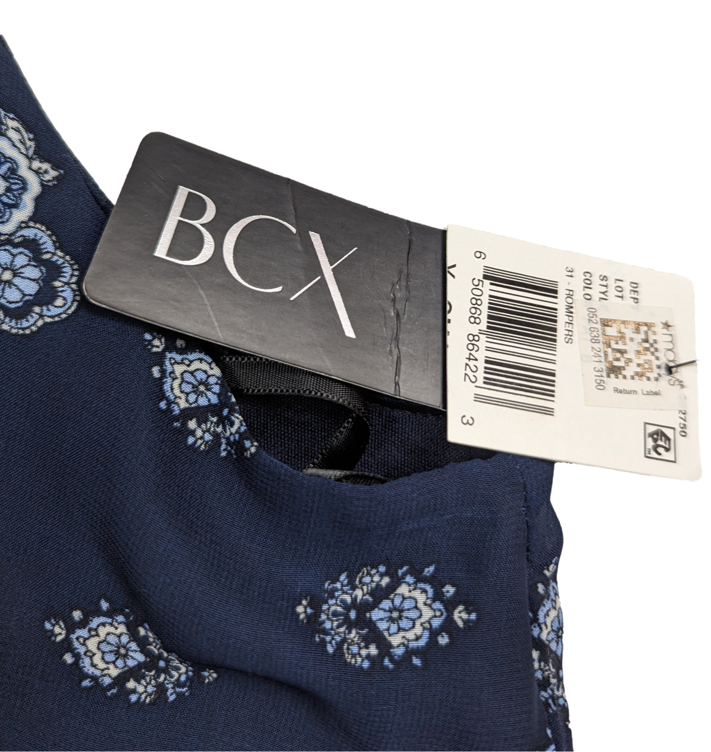 BCX Navy Halter Neck Romper Size XS NWT  Go ahead, BCX your fashion game with this navy halter neck romper. Perfect for any occasion, the stylish print and flatterin