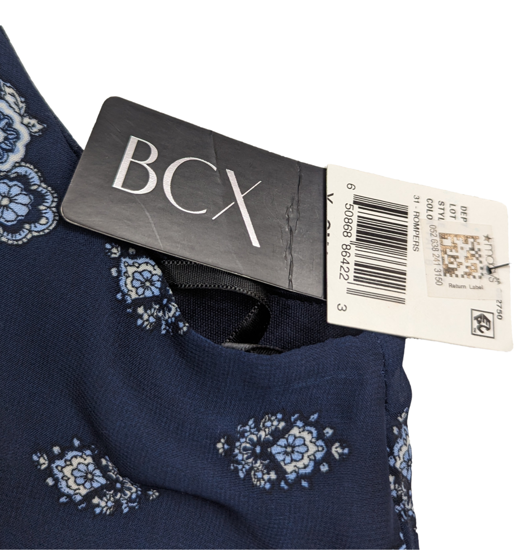 BCX Navy Halter Neck Romper Size XS NWT  Go ahead, BCX your fashion game with this navy halter neck romper. Perfect for any occasion, the stylish print and flatterin