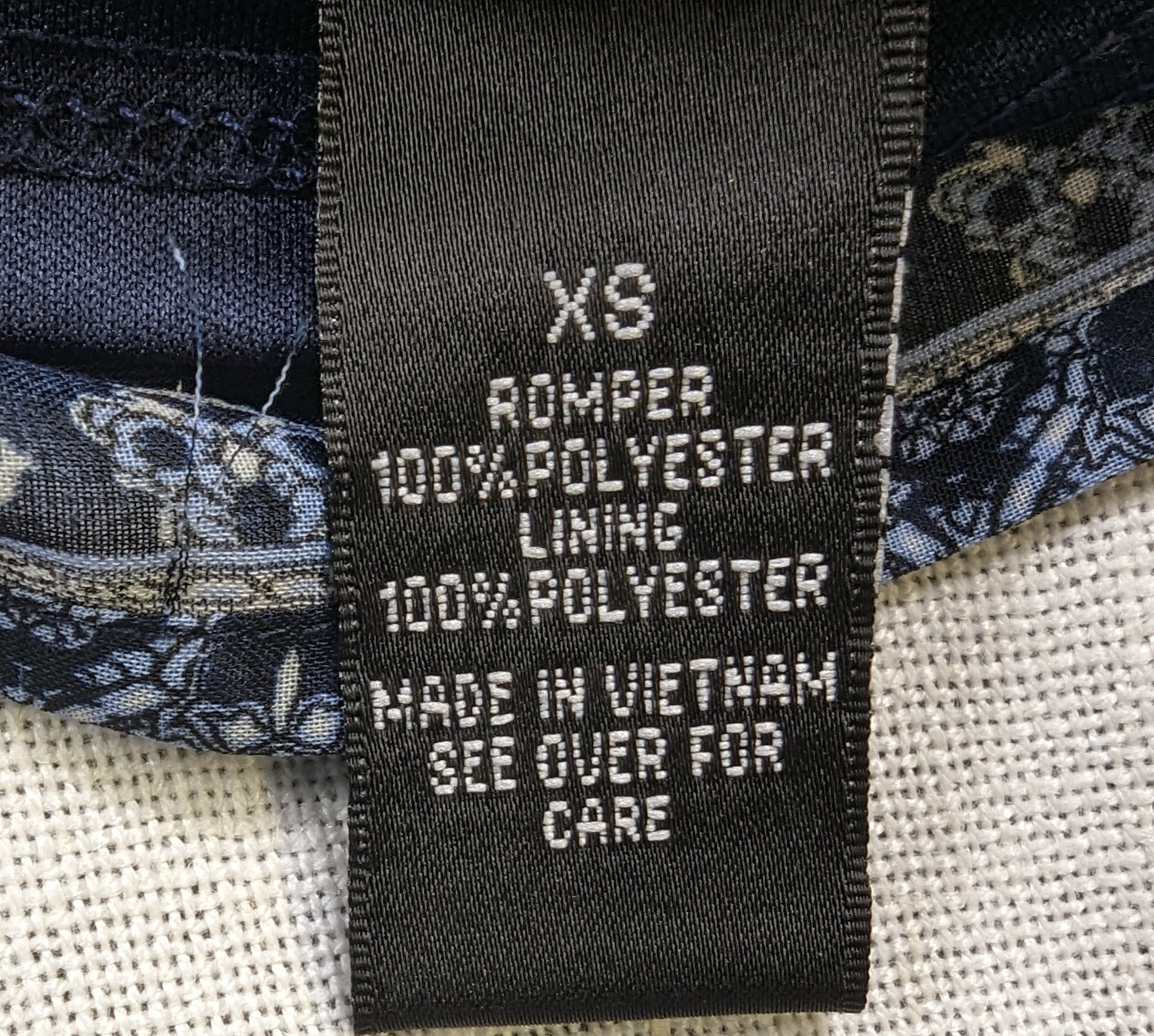 BCX Navy Halter Neck Romper Size XS NWT  Go ahead, BCX your fashion game with this navy halter neck romper. Perfect for any occasion, the stylish print and flatterin