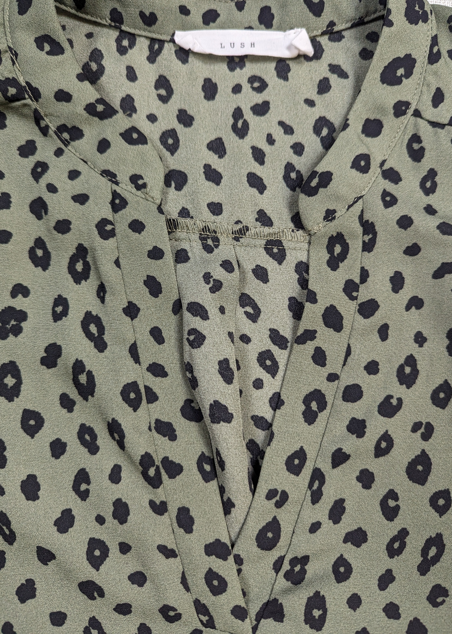 Lush Olive Green Dalmation Print Blouse Size Large Get ready to turn heads with this playful Lush Olive Green Dalmation Print Blouse in size Large! The unique Dalmat