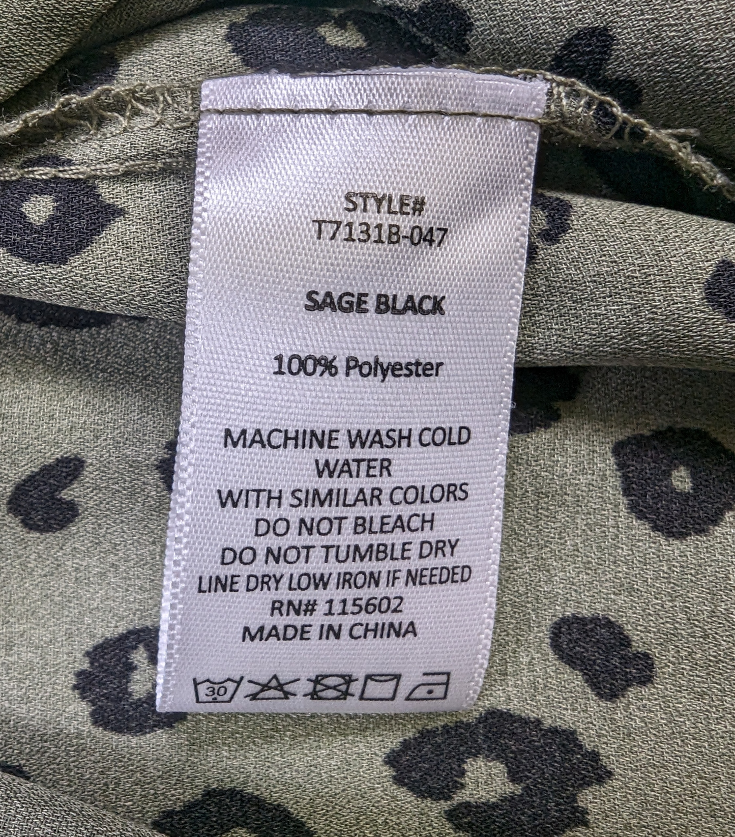 Lush Olive Green Dalmation Print Blouse Size Large Get ready to turn heads with this playful Lush Olive Green Dalmation Print Blouse in size Large! The unique Dalmat