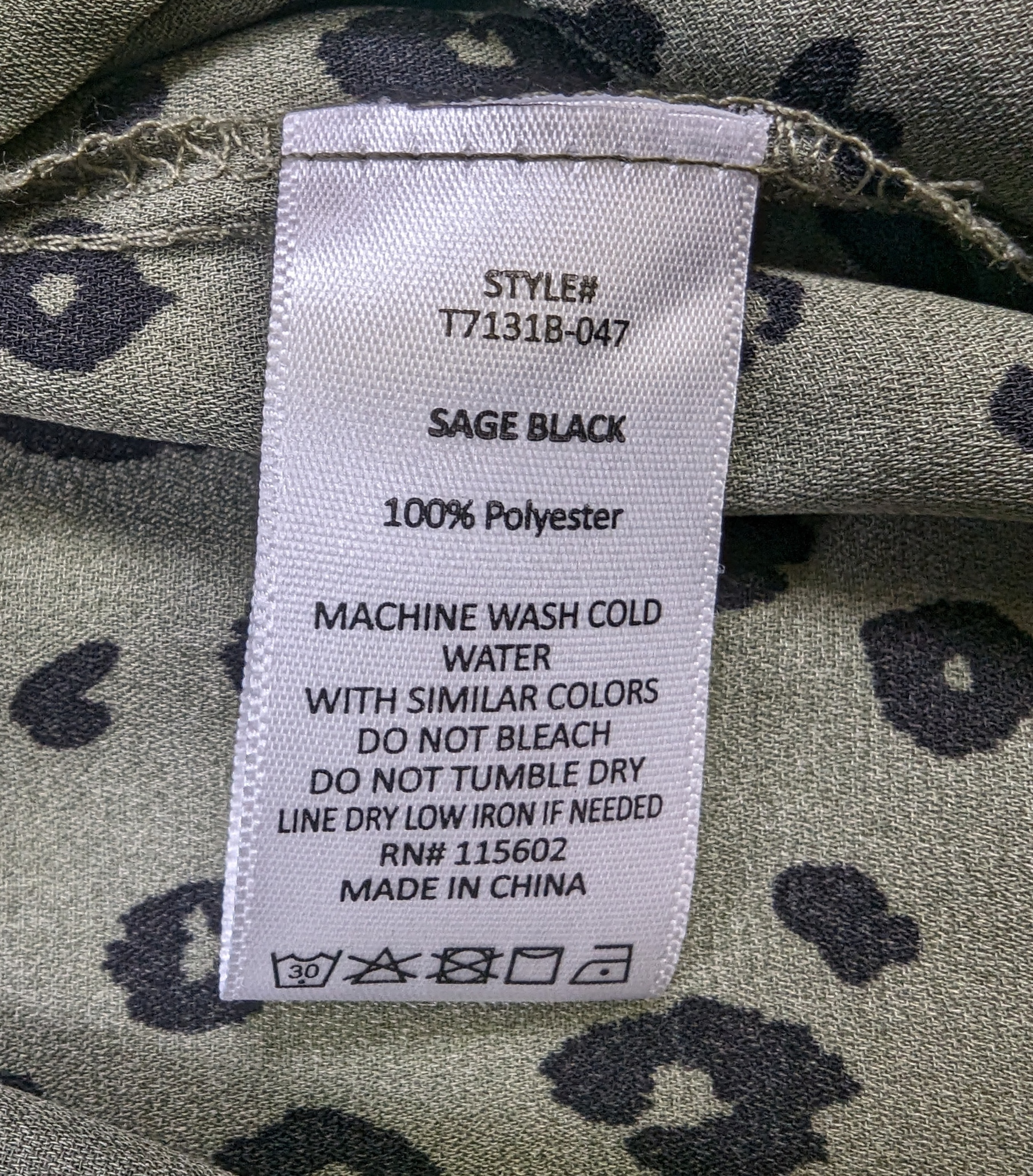 Lush Olive Green Dalmation Print Blouse Size Large Get ready to turn heads with this playful Lush Olive Green Dalmation Print Blouse in size Large! The unique Dalmat