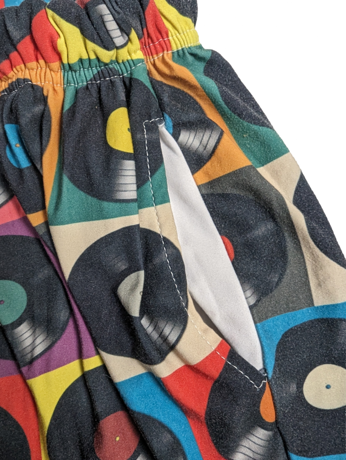 Brief Insanity Vinyl Record Design Lounge Pants Size Medium Get ready to rock and relax in these Brief Insanity Vinyl Record Design Lounge Pants! Featuring a unique