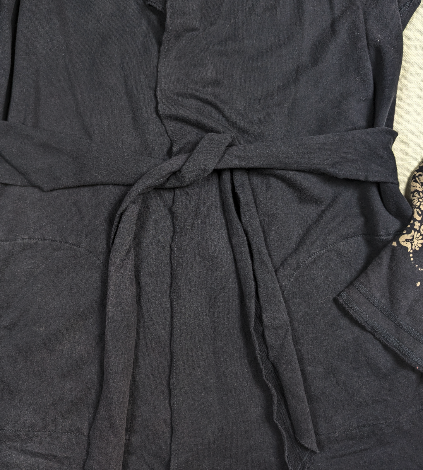 Lucky Brand Wrap Kimono Jingo Stay cozy and on-trend with the Lucky Brand Jacket. The attached belt cinches at the waist for a flattering fit, while the boho design
