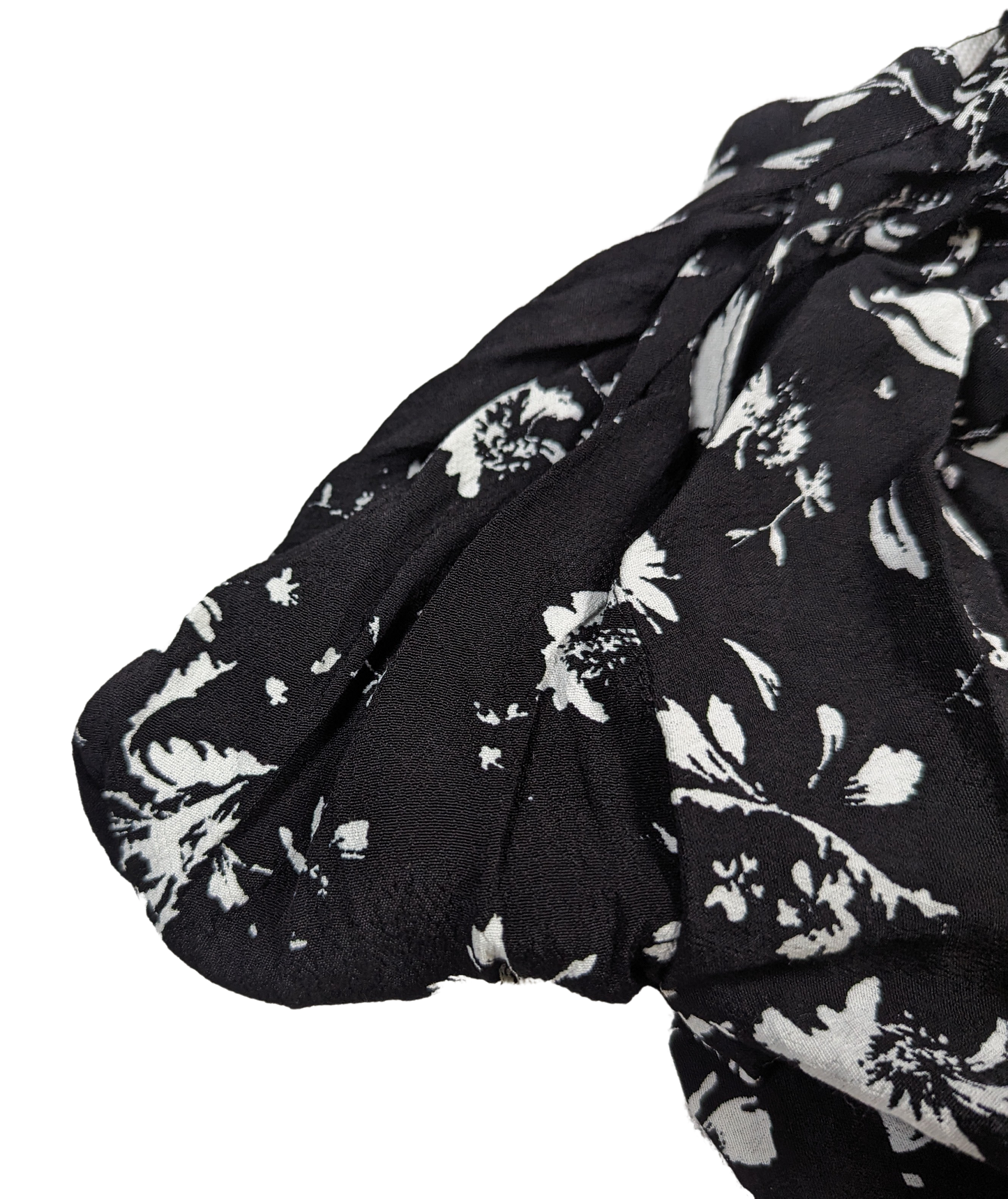 Free People Black and White Smocked Jumpsuit Size XS Go bold and free with the Free People Jumpsuit! This black and white stunner features adjustable shoulder ties a