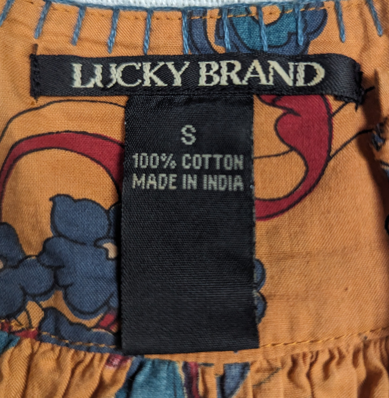 Lucky Brand Printed Tank Top Size Small Get lucky with this playful printed tank top from Lucky Brand! Perfect for any occasion, this tank features a unique floral print and tie straps for added fun. Avail