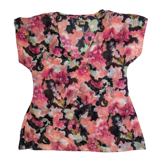 Show Me Your MuMu Abstract Print Sheer Top Be bold and playful in the Show Me Your MuMu Abstract Print Sheer Top. This semi-sheer top features a vibrant abstract floral print, perfect for making a statement.