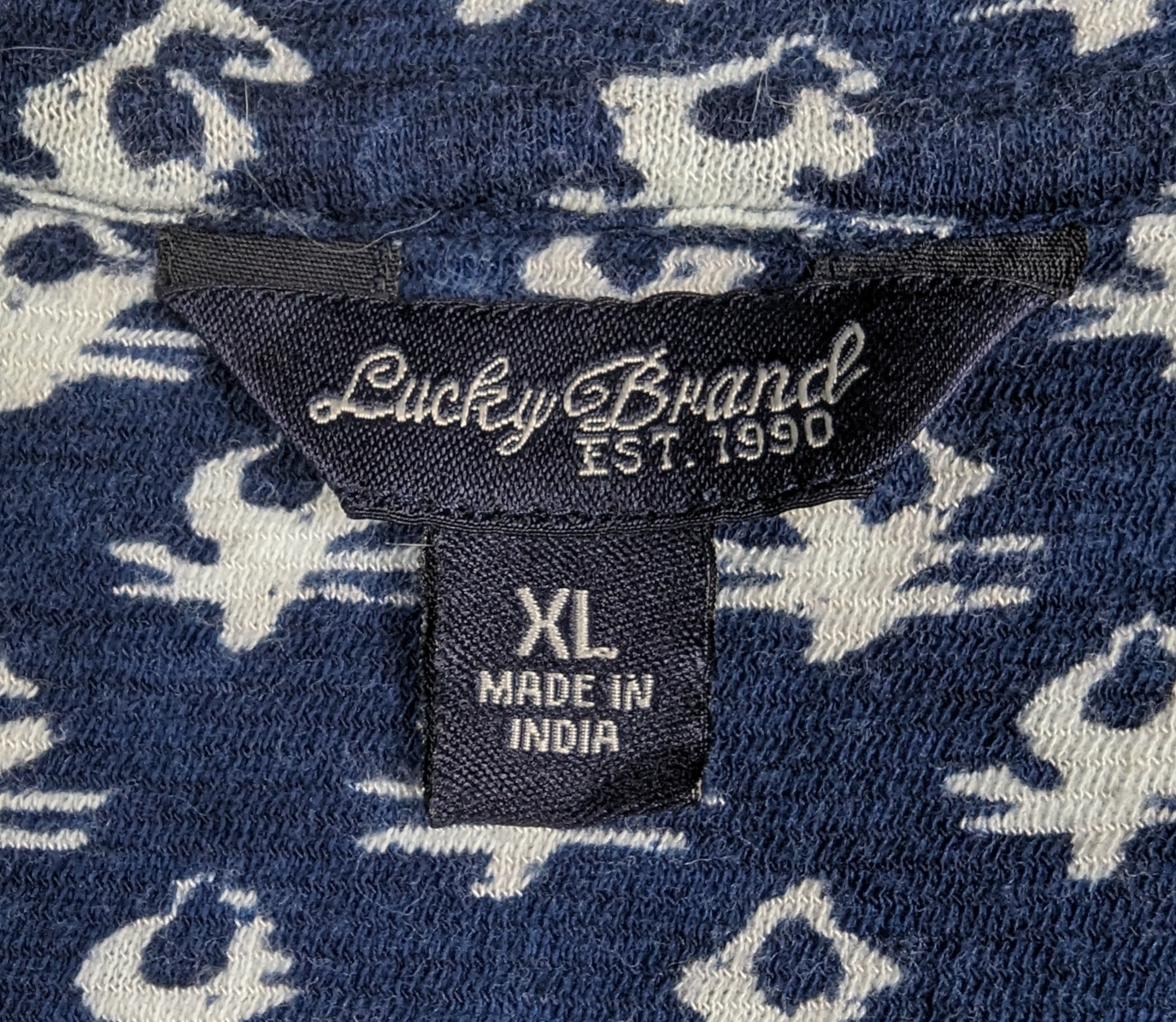 Lucky Brand Three Quarter Sleeve Top Size XL Add some luck to your wardrobe with this three quarter sleeve top from Lucky Brand. The lightweight fabric, blue with white print, and red embroidery around the bott