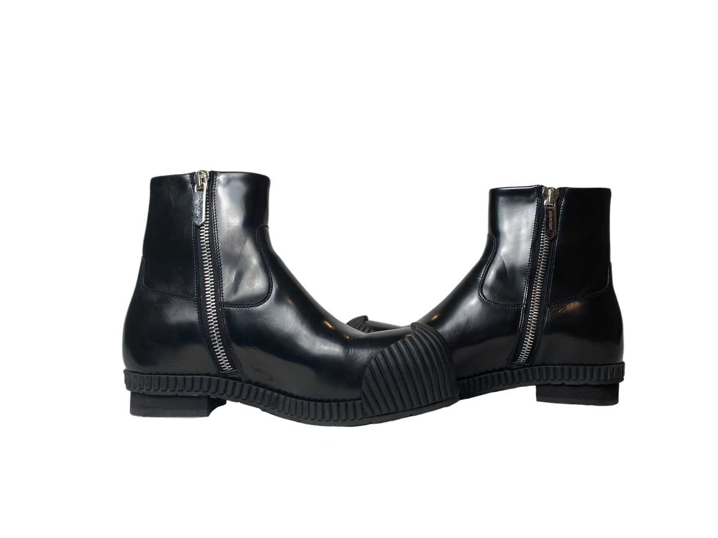 Calvin KleinStep up your fashion game with these Calvin Klein Deicine Spazzolato (205W39NYC) black leather ankle boots! These sleek and stylish boots are dressed to kill with a ShoesCalvin Klein Deicine Spazzolato Black Leather Ankle BootsCalvin Klein Deicine Spazzolato Black Leather Ankle Boots