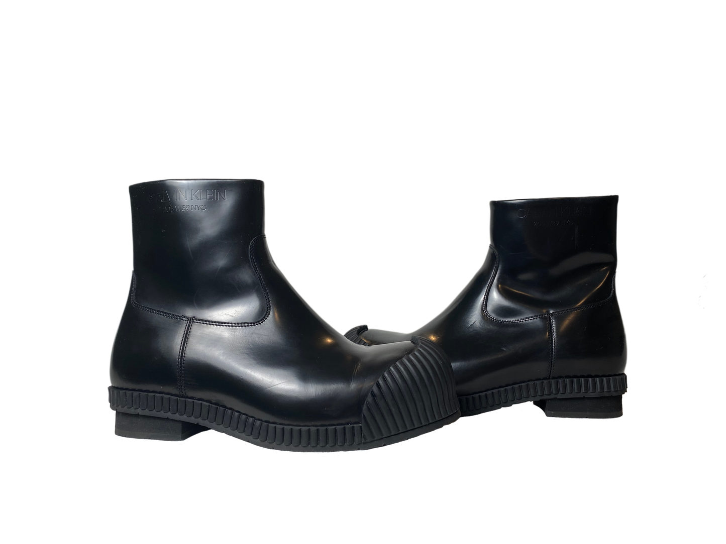 Calvin KleinStep up your fashion game with these Calvin Klein Deicine Spazzolato (205W39NYC) black leather ankle boots! These sleek and stylish boots are dressed to kill with a ShoesCalvin Klein Deicine Spazzolato Black Leather Ankle BootsCalvin Klein Deicine Spazzolato Black Leather Ankle Boots