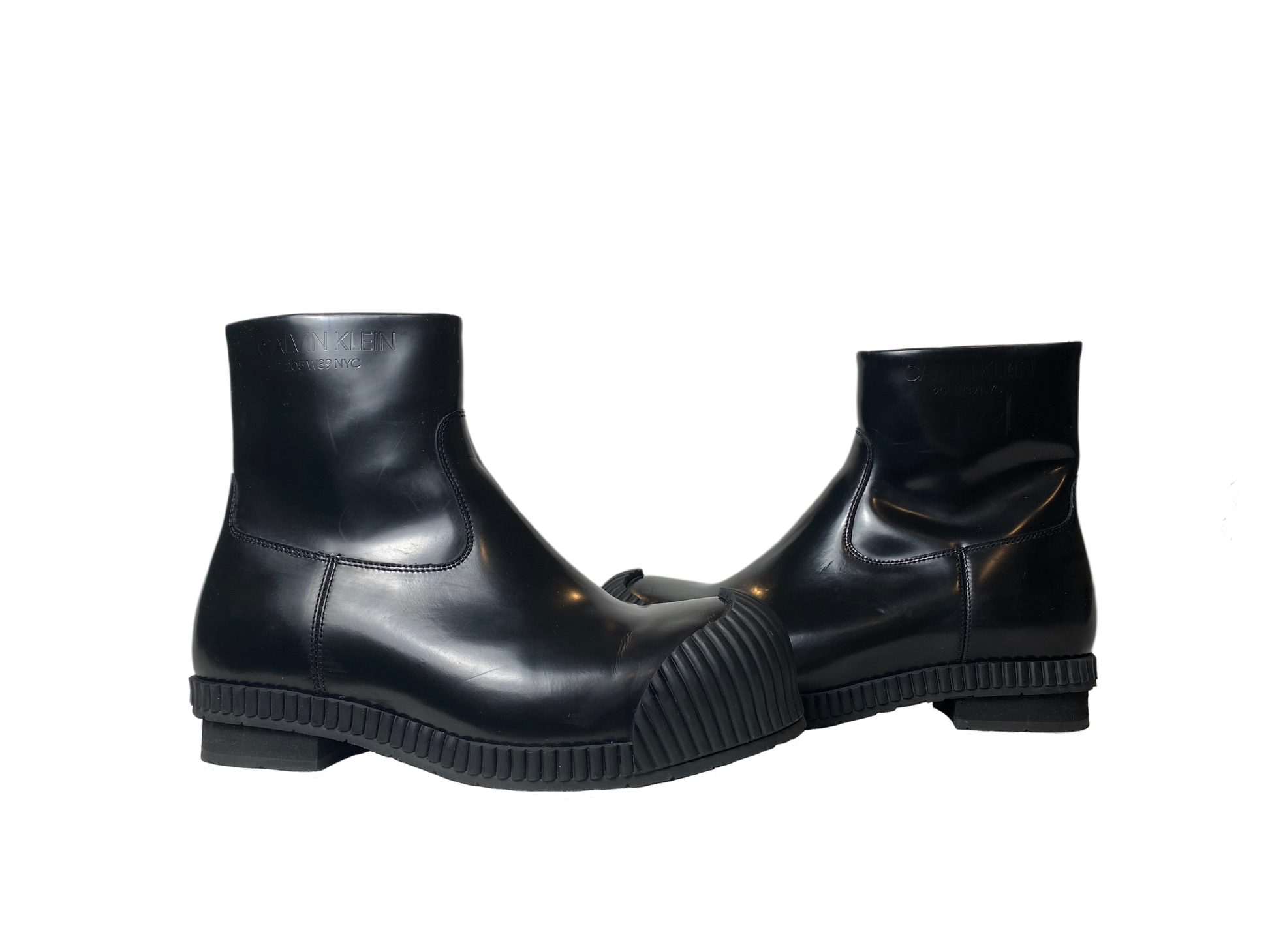 Calvin KleinStep up your fashion game with these Calvin Klein Deicine Spazzolato (205W39NYC) black leather ankle boots! These sleek and stylish boots are dressed to kill with a ShoesCalvin Klein Deicine Spazzolato Black Leather Ankle BootsCalvin Klein Deicine Spazzolato Black Leather Ankle Boots