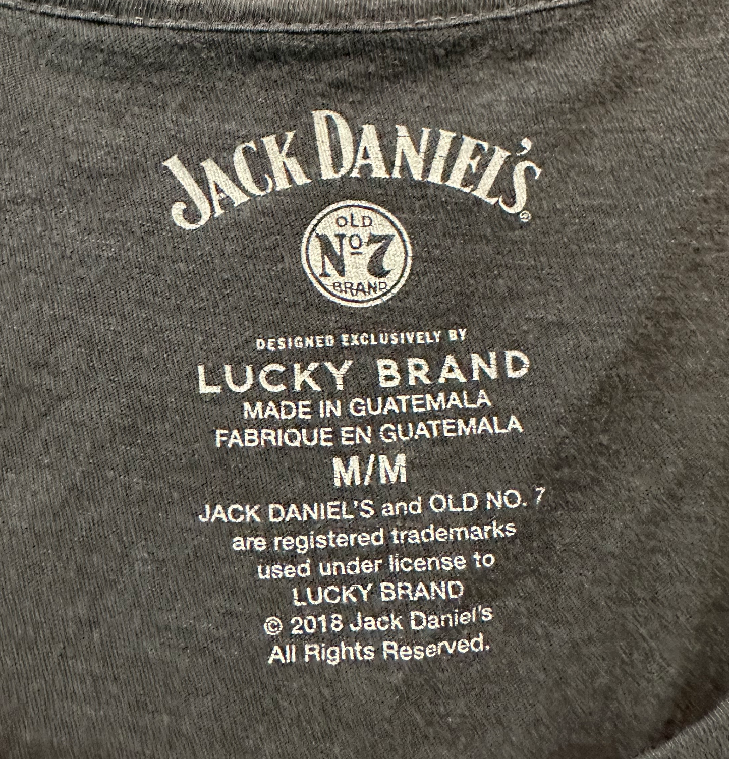 Lucky BrandServing up attitude and style, lucky you – you've got this Lucky Brand distressed (with holes) Jack Daniels T-Shirt! This short-sleeved tee features a distressed desShirts & TopsLucky Brand Distressed Jack Daniels T-ShirtLucky Brand Distressed Jack Daniels