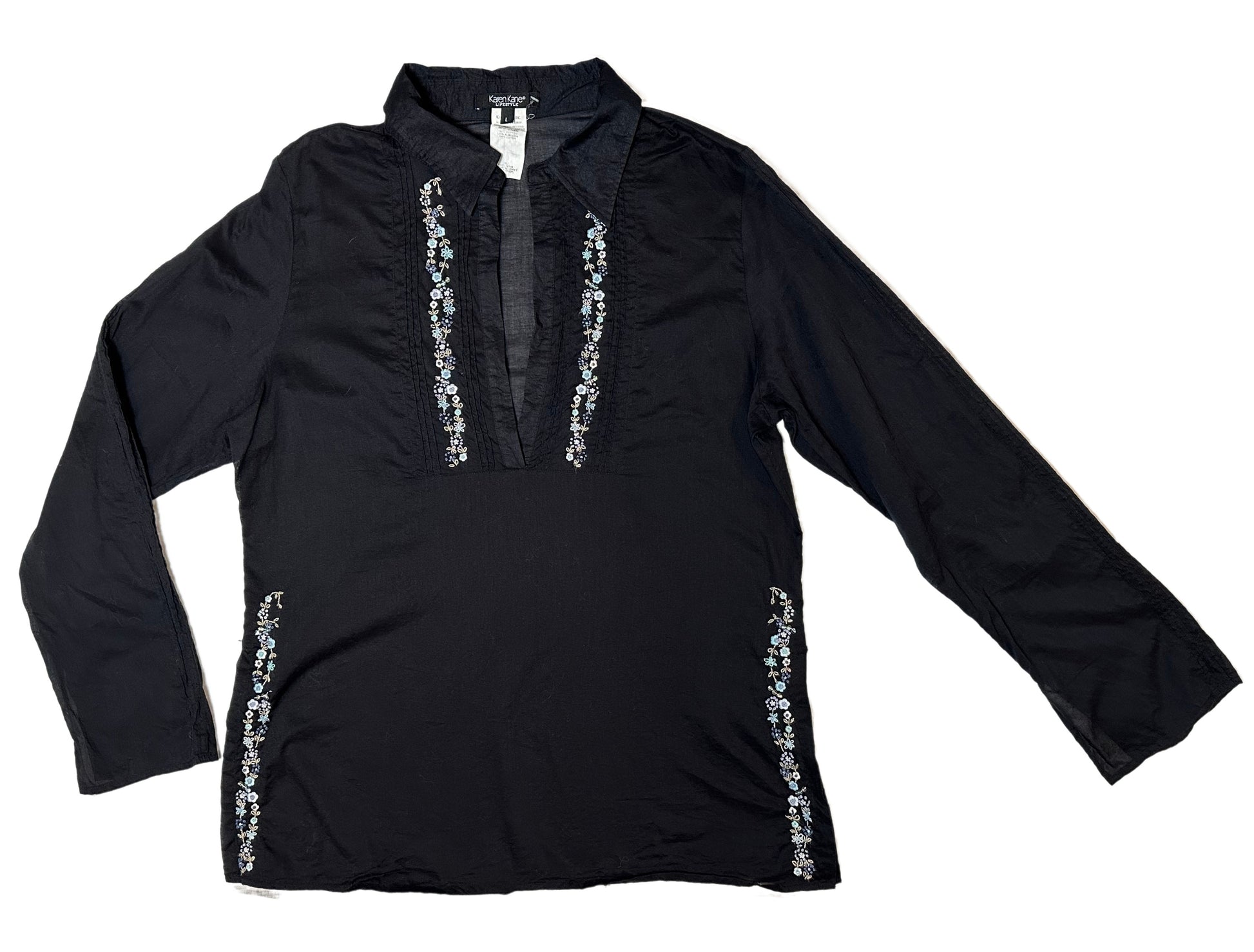 Karen KaneEnhance your wardrobe with this timelessly chic Karen Kane blouse. Delicately crafted from 100% cotton, its split collar and cuffs lend a relaxed elegance, while theBlouseKaren Kane Black Semi Sheer Boho Blouse with Embroidery DetailsKaren Kane Black Semi Sheer Boho Blouse
