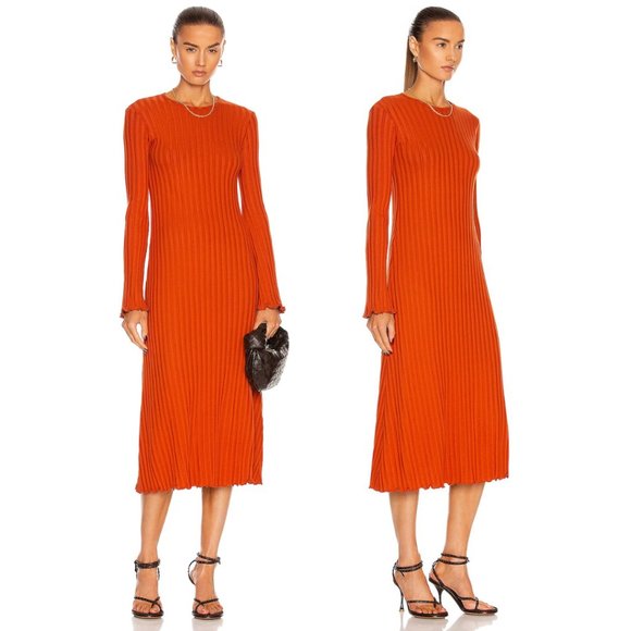 Simon MillerLook spectacularly polished and put-together in the Simon Miller Orange Ribbed Midi Long Sleeve Dress. This exquisite piece is in like new condition, and features a dressSimon Miller Orange Ribbed Midi Long Sleeve DressSimon Miller Orange Ribbed Midi Long Sleeve Dress