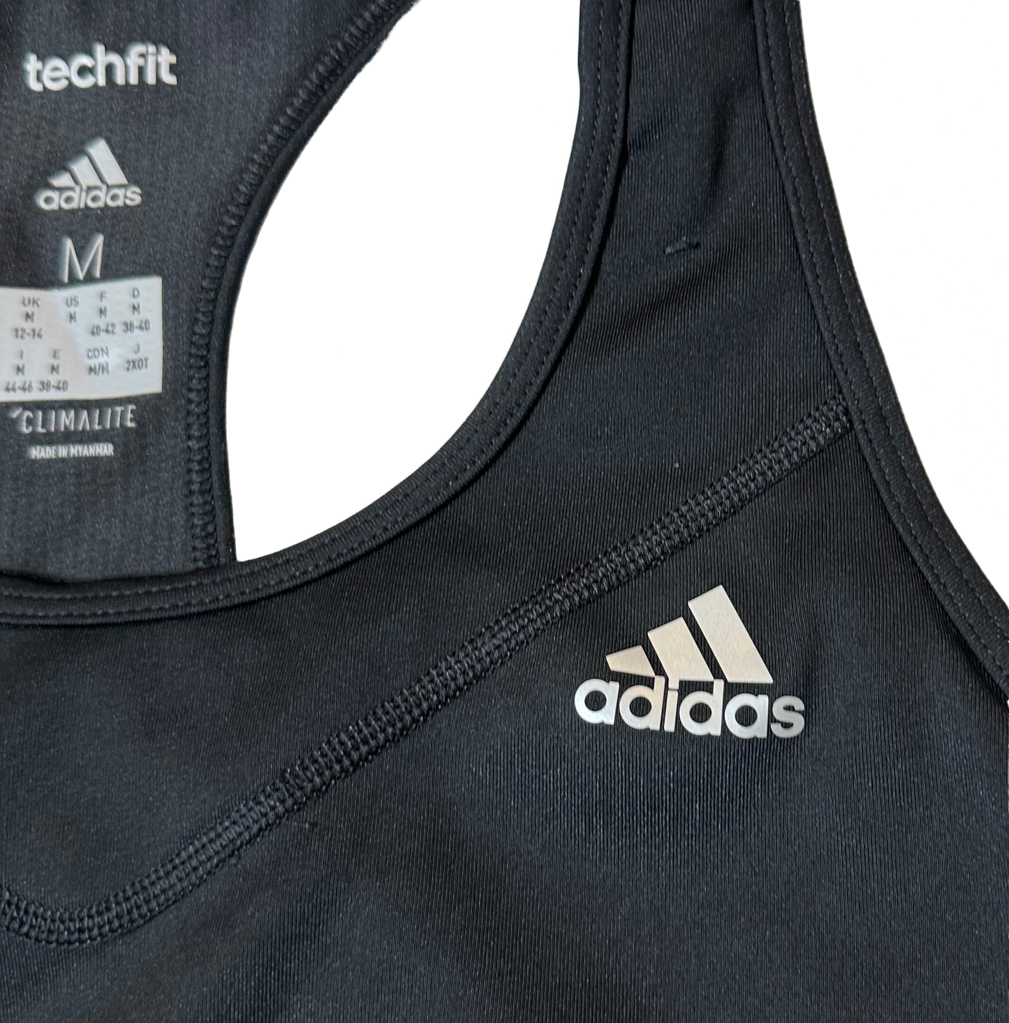 Adidas Techfit Climate Black Sports Bra size Medium Get ready to crush your workout with this Adidas Techfit Climate black sports bra in size medium. Featuring a razor ba