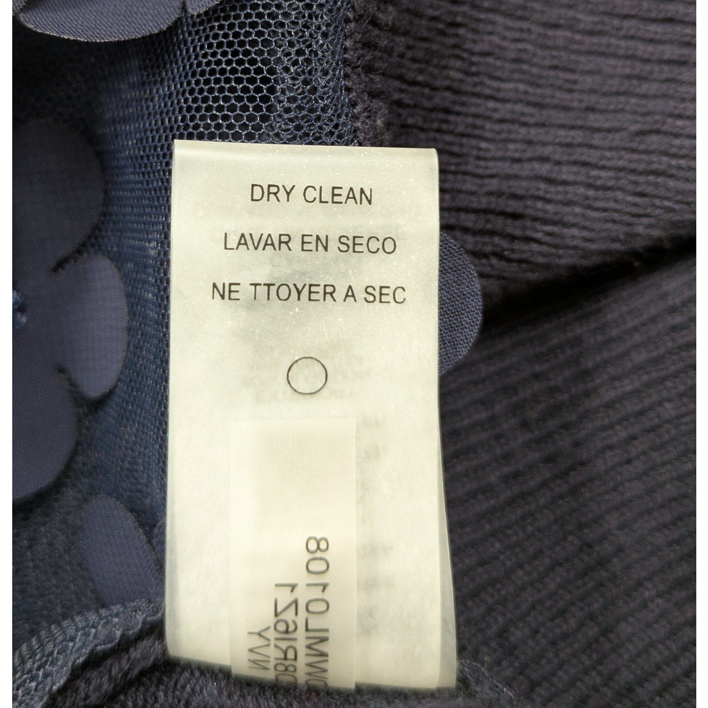 Karl Lagerfeld Navy Cardigan with Sheer Front & Flower appliques Sz L Add a touch of sass to your wardrobe with the Karl Lagerfeld Navy Cardigan. The sheer front is