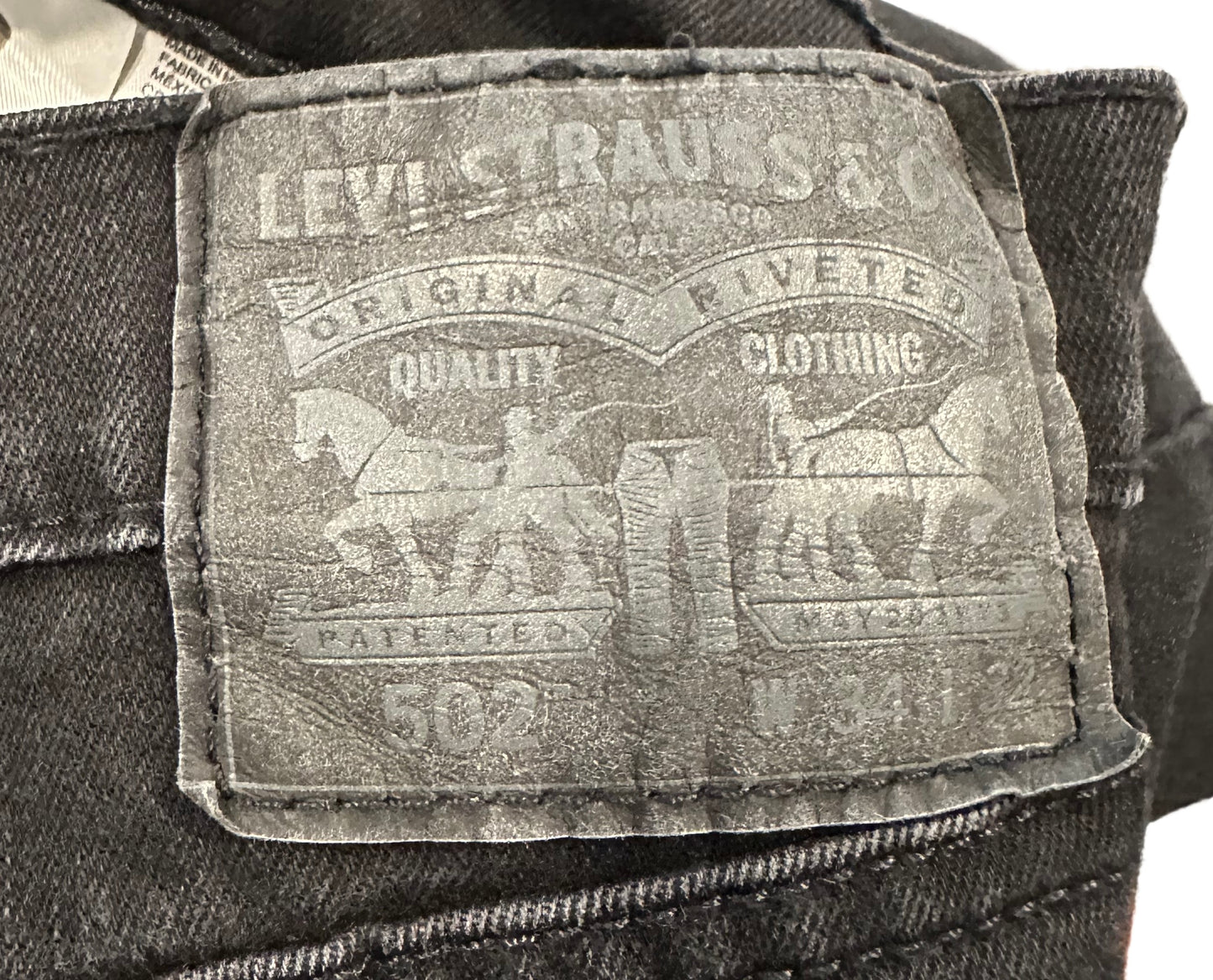 REFRESHED - Levi's 502 Denim Custom Bleached Black Jeans Size 34 x 32 Revamp your wardrobe with REFRESHED Levi's 502 Black Denim! These custom bleached jeans feature a cla
