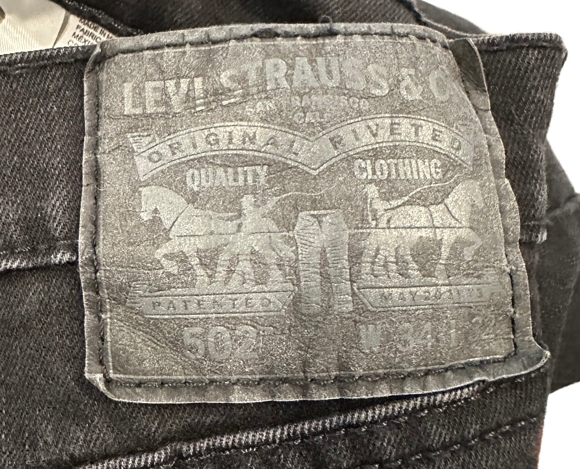 REFRESHED - Levi's 502 Denim Custom Bleached Black Jeans Size 34 x 32 Revamp your wardrobe with REFRESHED Levi's 502 Black Denim! These custom bleached jeans feature a cla