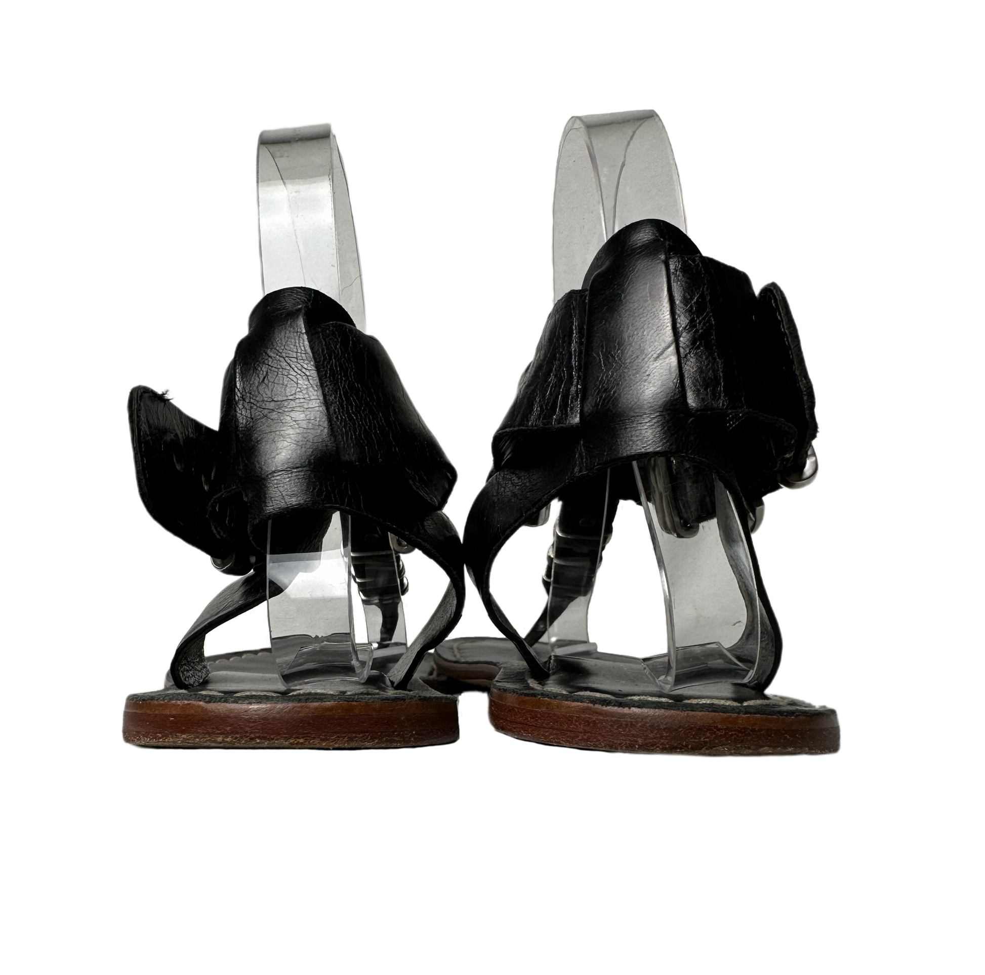 BernardoEmbrace bold style with the Bernardo Milan sandal! Crafted from smooth leather and featuring chunky silver metal accents, these T-strap sandals will inspire your advShoesBernardo Milan Flat T-strap Black Leather Sandal-strap Black Leather Sandal