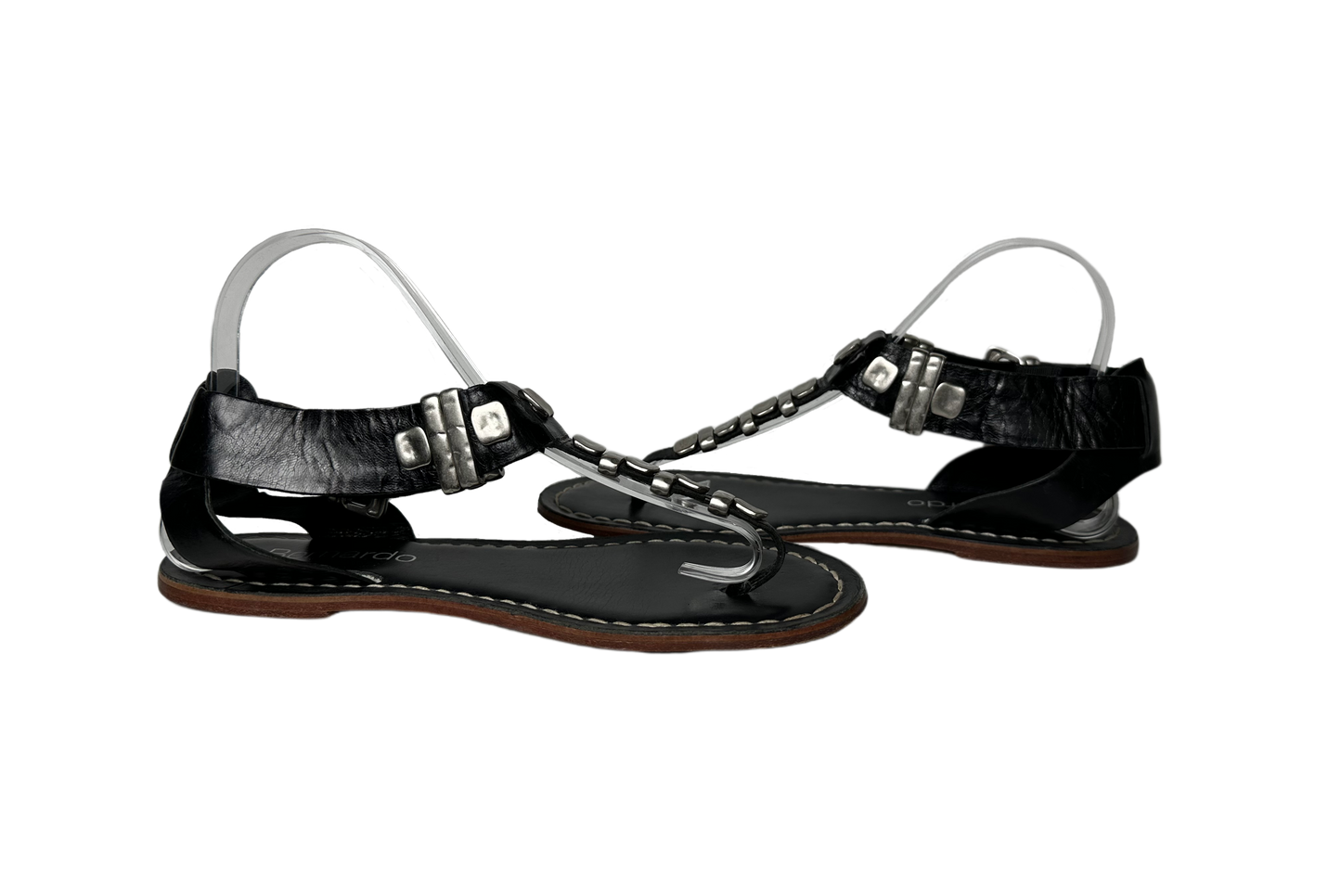 BernardoEmbrace bold style with the Bernardo Milan sandal! Crafted from smooth leather and featuring chunky silver metal accents, these T-strap sandals will inspire your advShoesBernardo Milan Flat T-strap Black Leather Sandal-strap Black Leather Sandal
