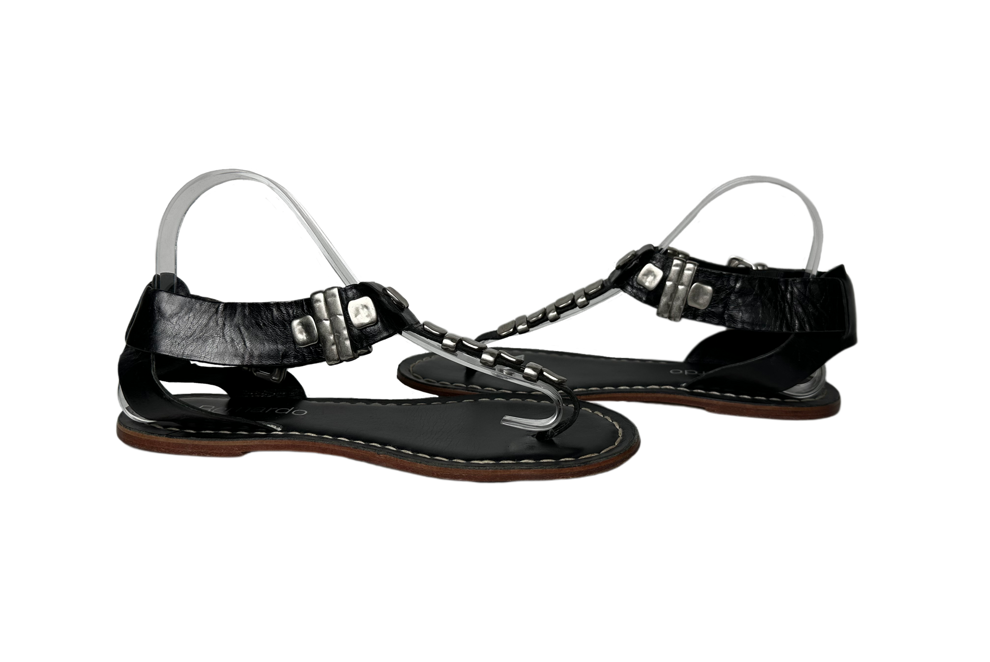 BernardoEmbrace bold style with the Bernardo Milan sandal! Crafted from smooth leather and featuring chunky silver metal accents, these T-strap sandals will inspire your advShoesBernardo Milan Flat T-strap Black Leather Sandal-strap Black Leather Sandal