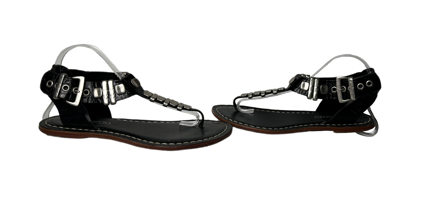 BernardoEmbrace bold style with the Bernardo Milan sandal! Crafted from smooth leather and featuring chunky silver metal accents, these T-strap sandals will inspire your advShoesBernardo Milan Flat T-strap Black Leather Sandal-strap Black Leather Sandal